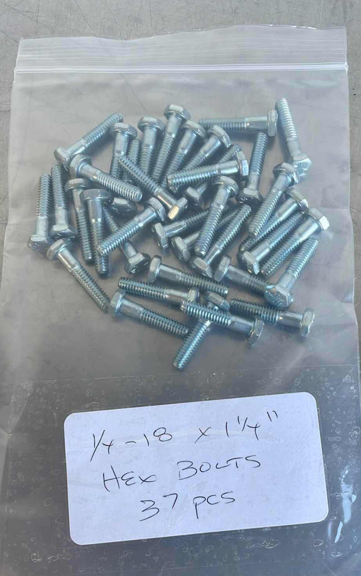 Photo 1 of 1/4-18 X 1-1/4" HEX BOLTS 37 PCS