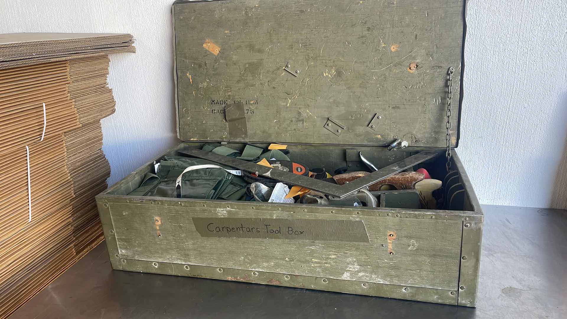 Photo 1 of MILITARY CARPENTERS TOOL BOX 32” x 16” x9” HINGES ON BOX ARE DAMAGED OR MISSING