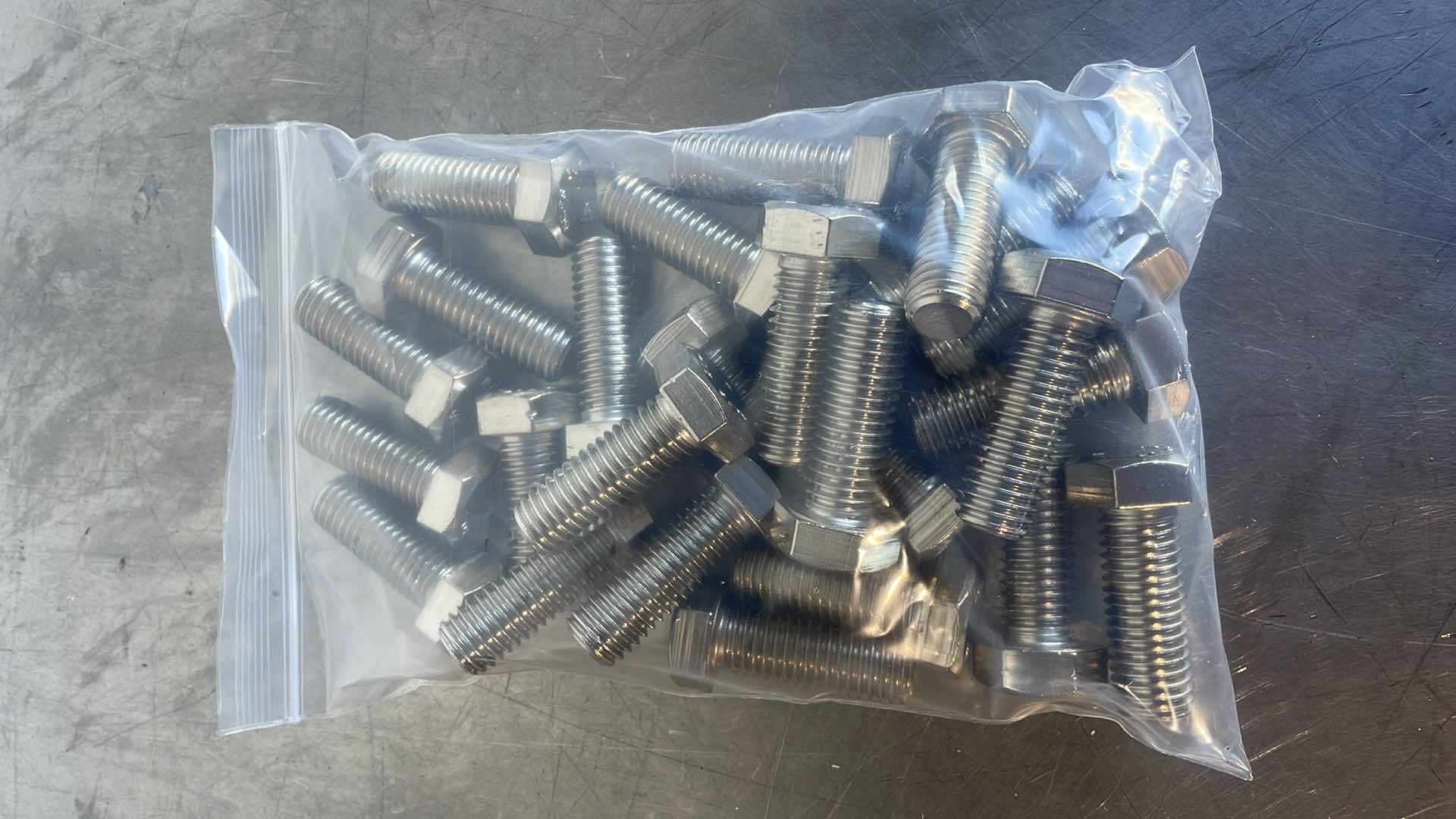 Photo 1 of STAINLESS STEEL HEX BOLT 5/8”-11 x 1-3/4” 25 PCS