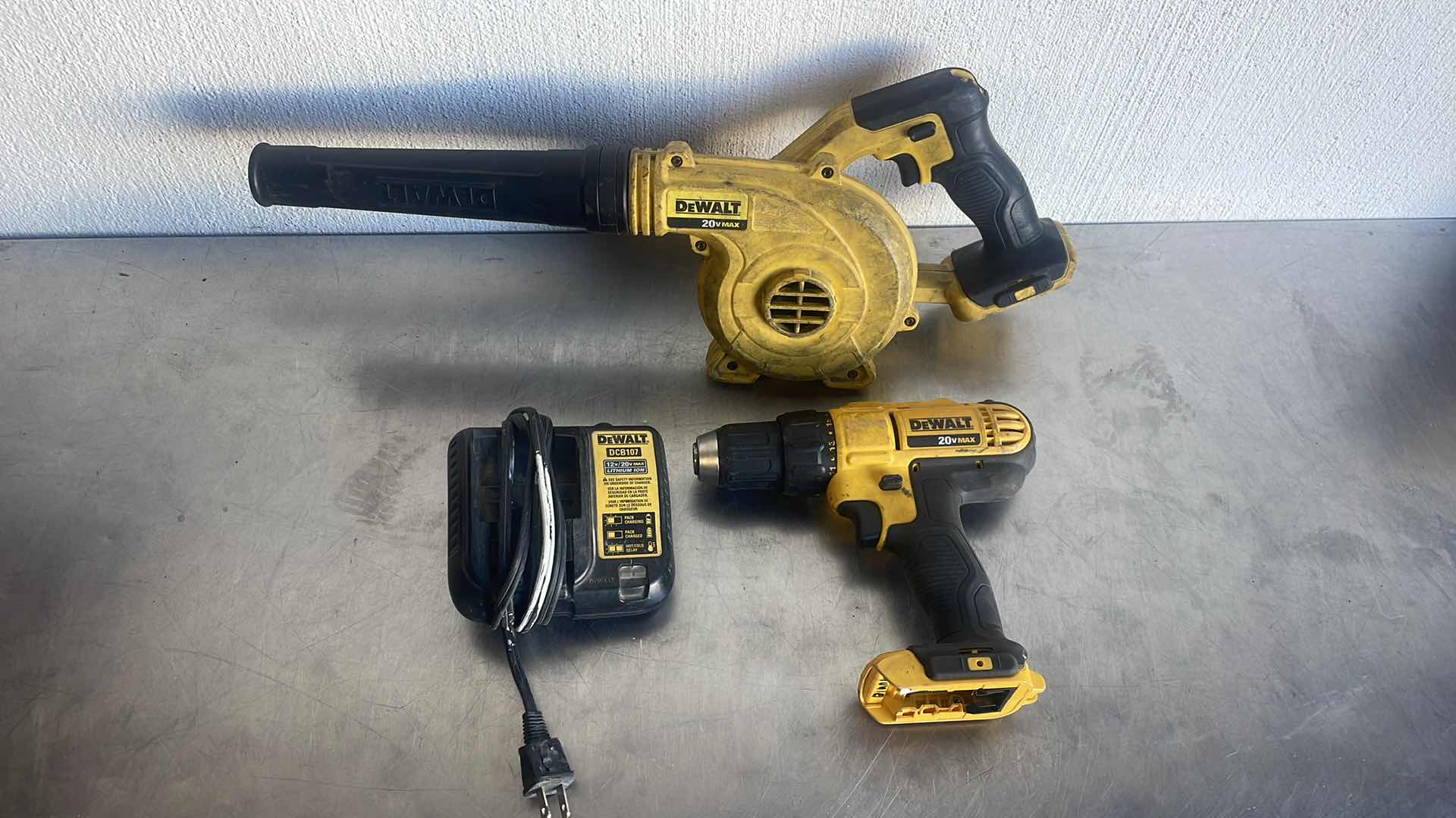 Photo 1 of DEWALT 20v 1/2” CORDLESS DRILL DRIVER CORDLESS BLOWER AND CHARGER