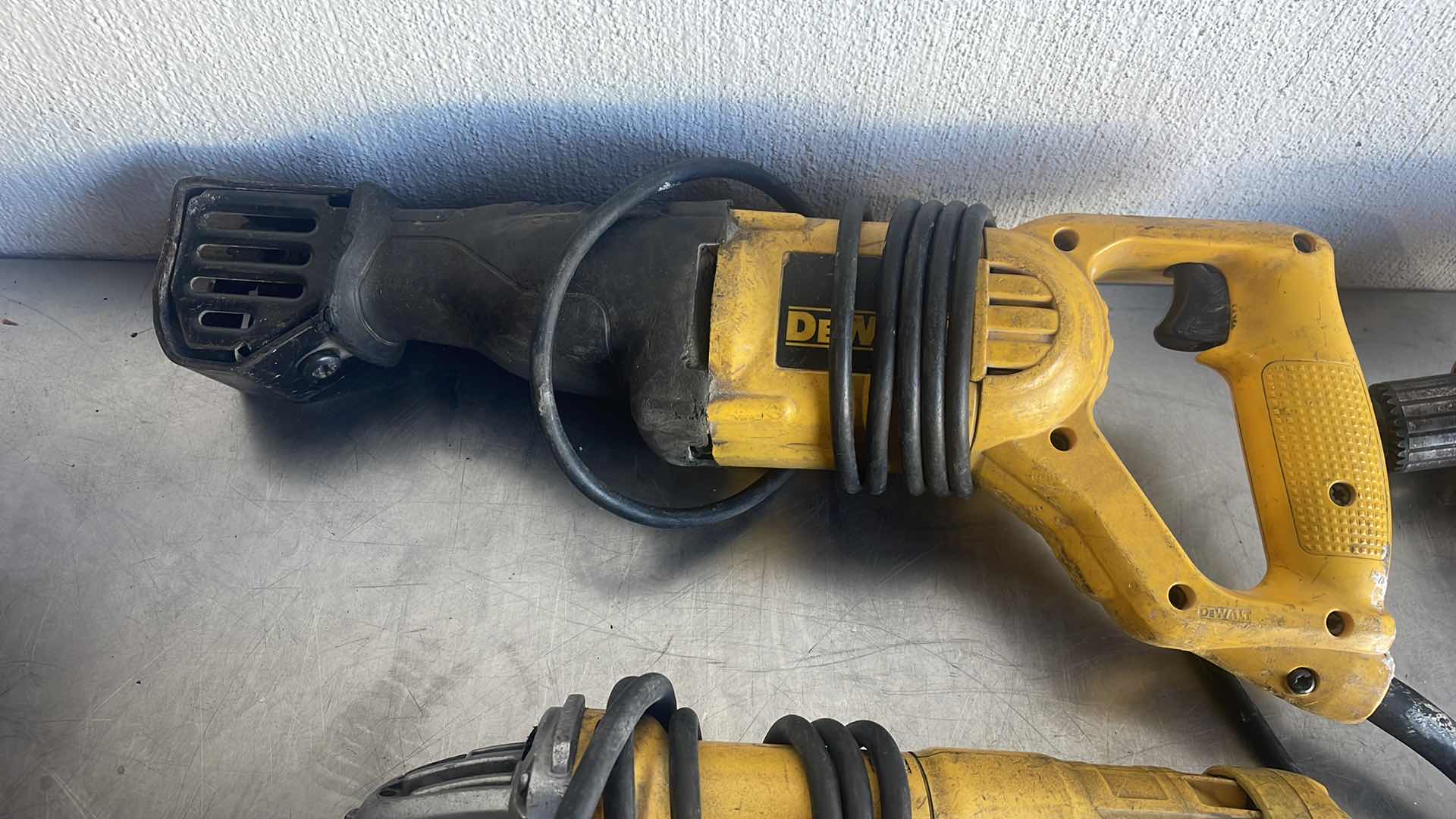 Photo 3 of DEWALT RECIPROCATING SAW 4 1/2” ANGLE GRINDER AND 3/8” DRILL