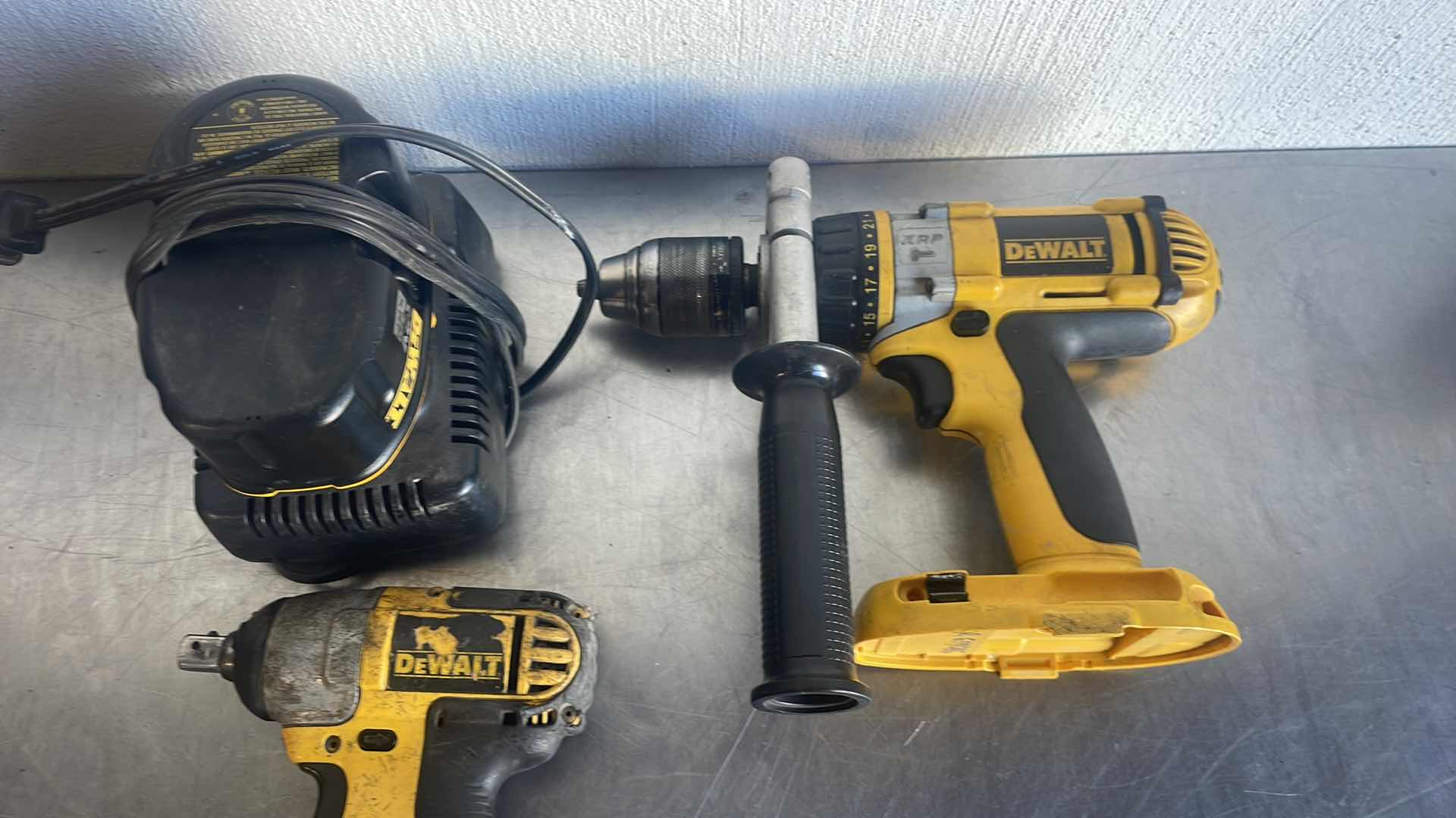 Photo 4 of DEWALT 18v 1/2” HAMMER DRILL DRIVER, 1/2” IMPACT WRENCH, RECIPROCATING SAW WITH CHARGER AND BATTERY