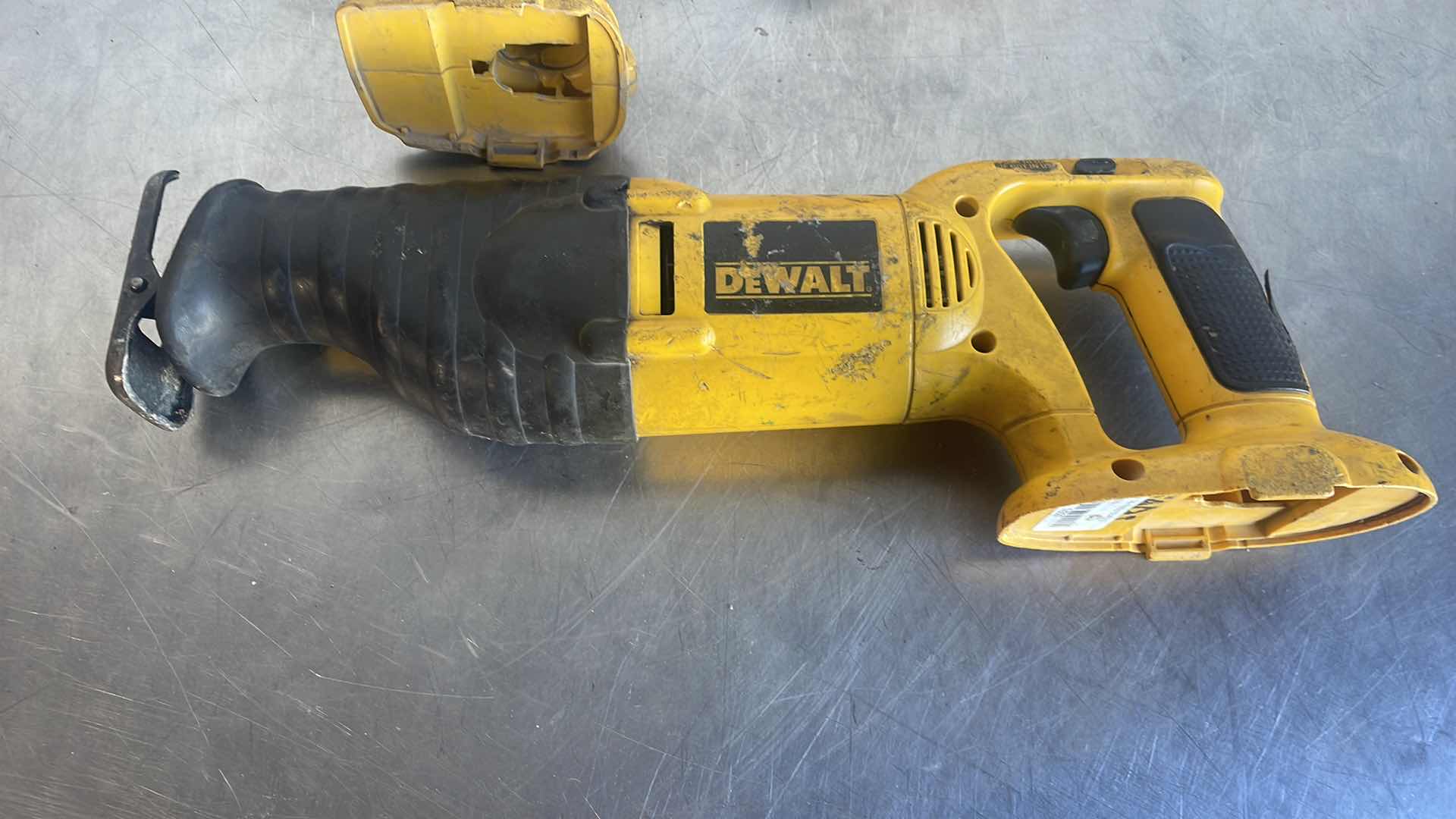 Photo 2 of DEWALT 18v 1/2” HAMMER DRILL DRIVER, 1/2” IMPACT WRENCH, RECIPROCATING SAW WITH CHARGER AND BATTERY