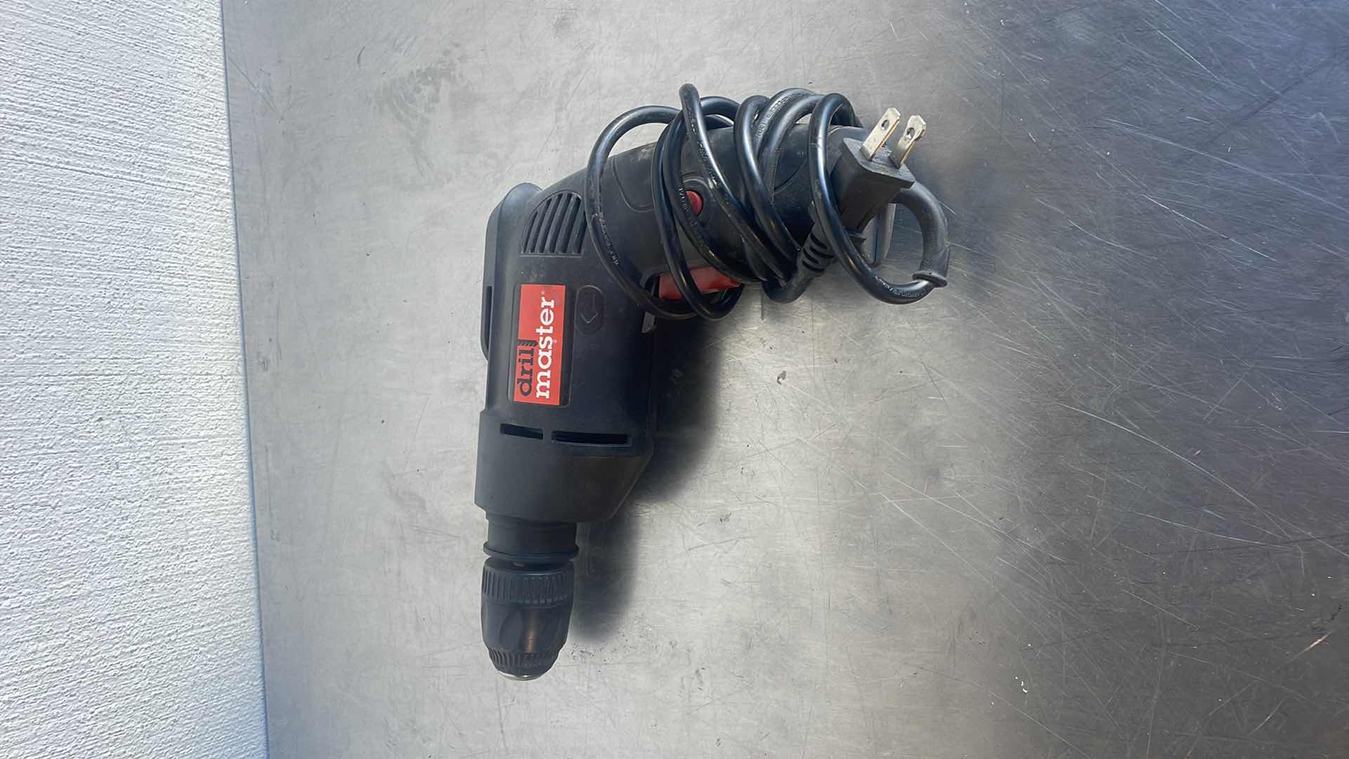 Photo 1 of DRILL MASTER 3/8” REVERSIBLE DRILL