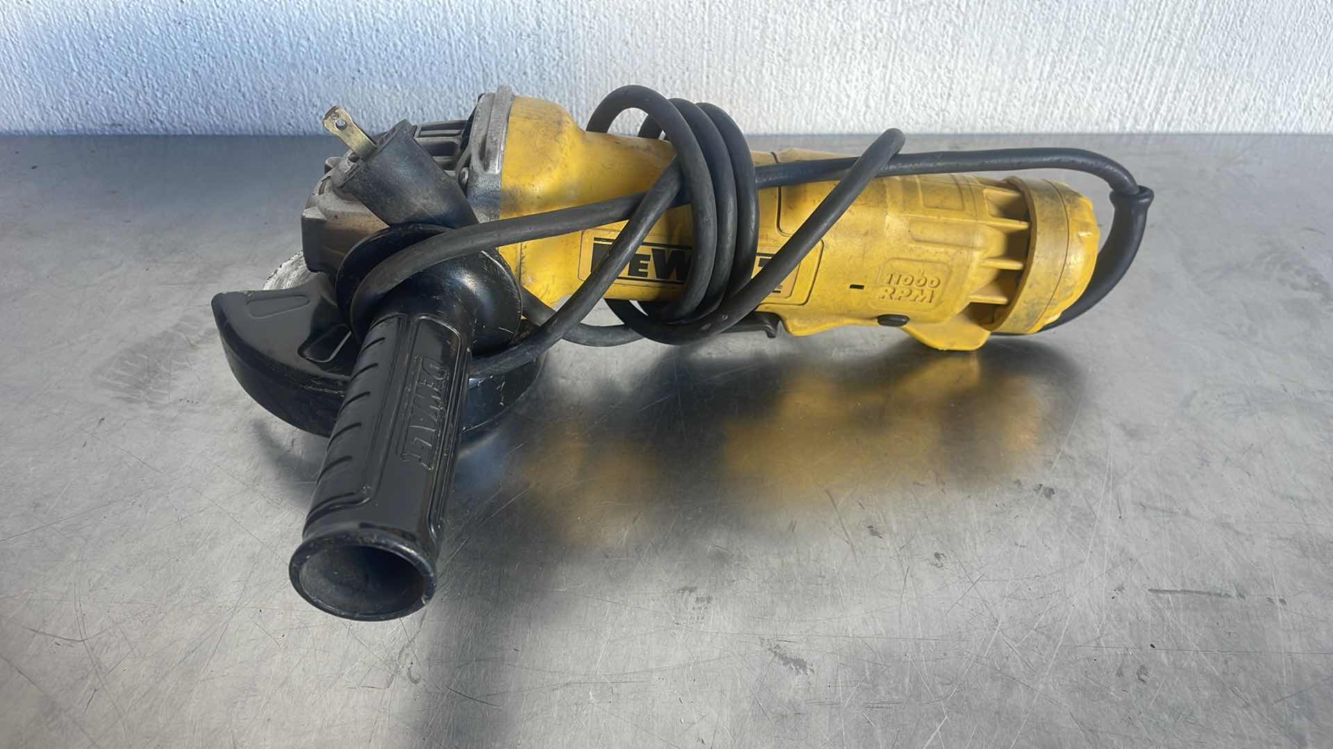 Photo 1 of DEWALT 4 1/2” ANGLE GRINDER