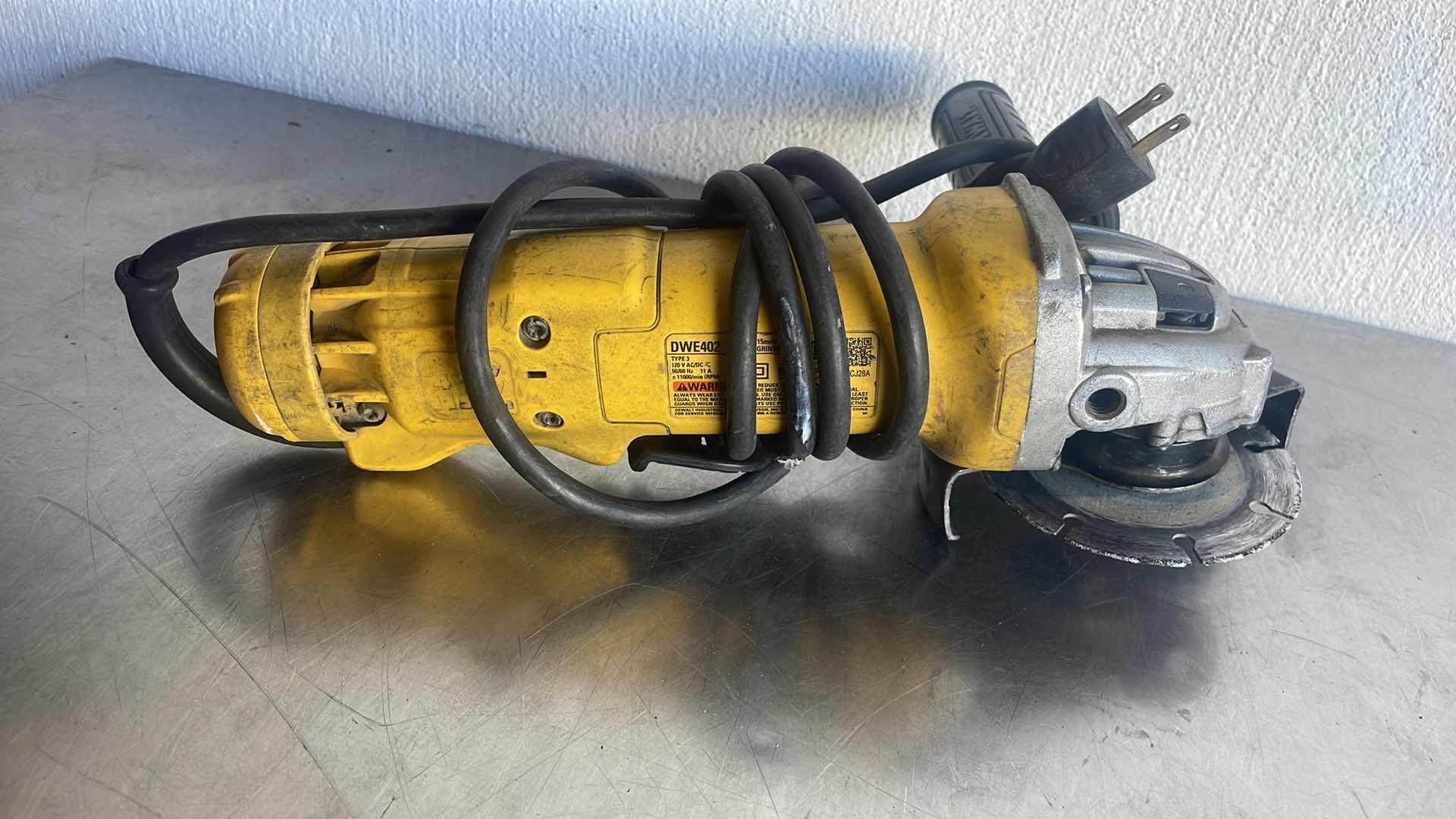 Photo 2 of DEWALT 4 1/2” ANGLE GRINDER