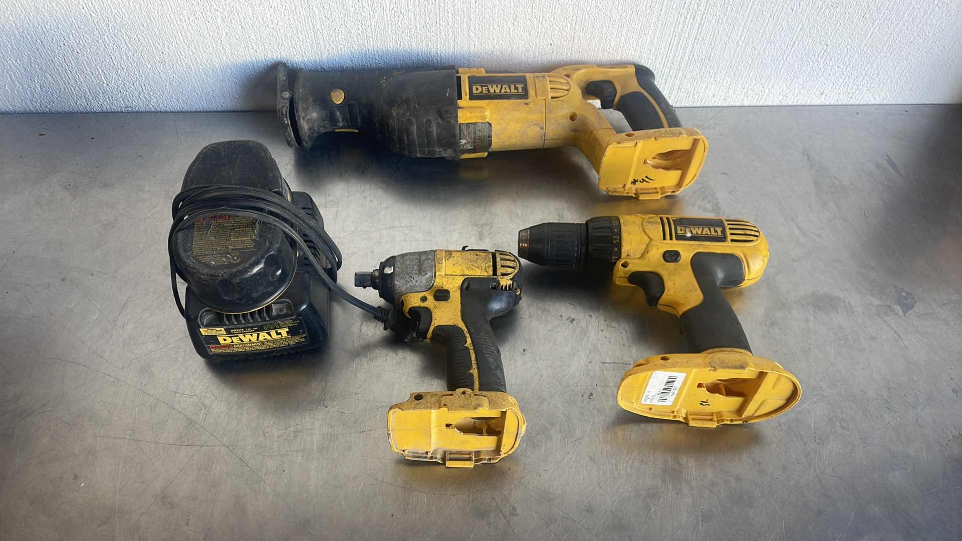 Photo 1 of DEWALT 18v RECIPROCATING SAW IMPACT WRENCH 1/2” CORDLESS DRIVER WITH CHARGER AND BATTERY