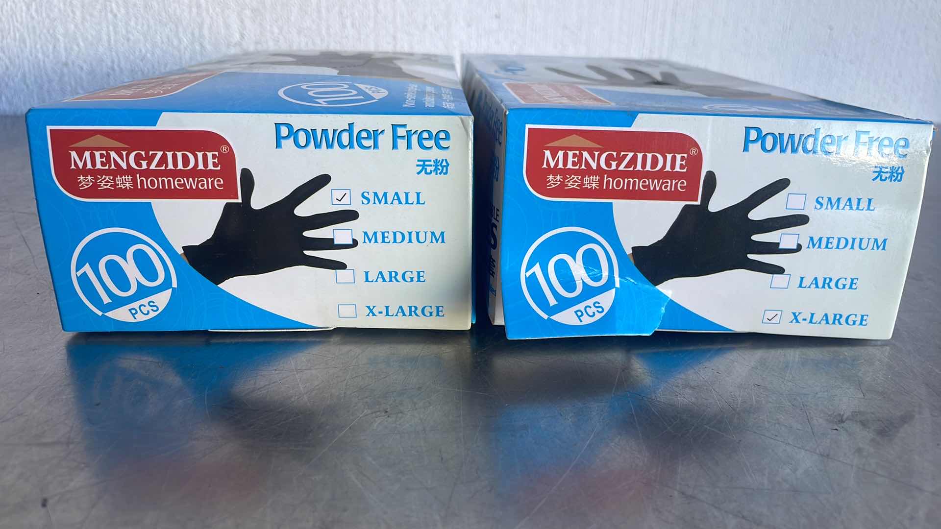 Photo 2 of BLACK POWDER FREE DISPOSABLE GLOVES SIZE XL & S