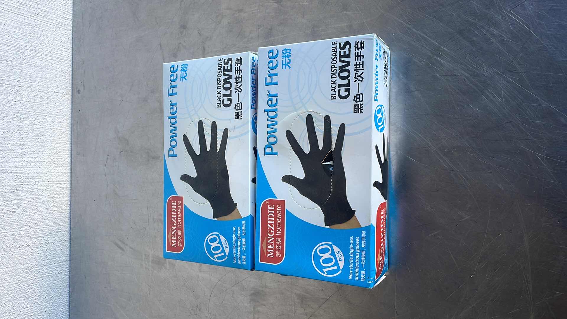 Photo 1 of BLACK POWDER FREE DISPOSABLE GLOVES SIZE XL & S