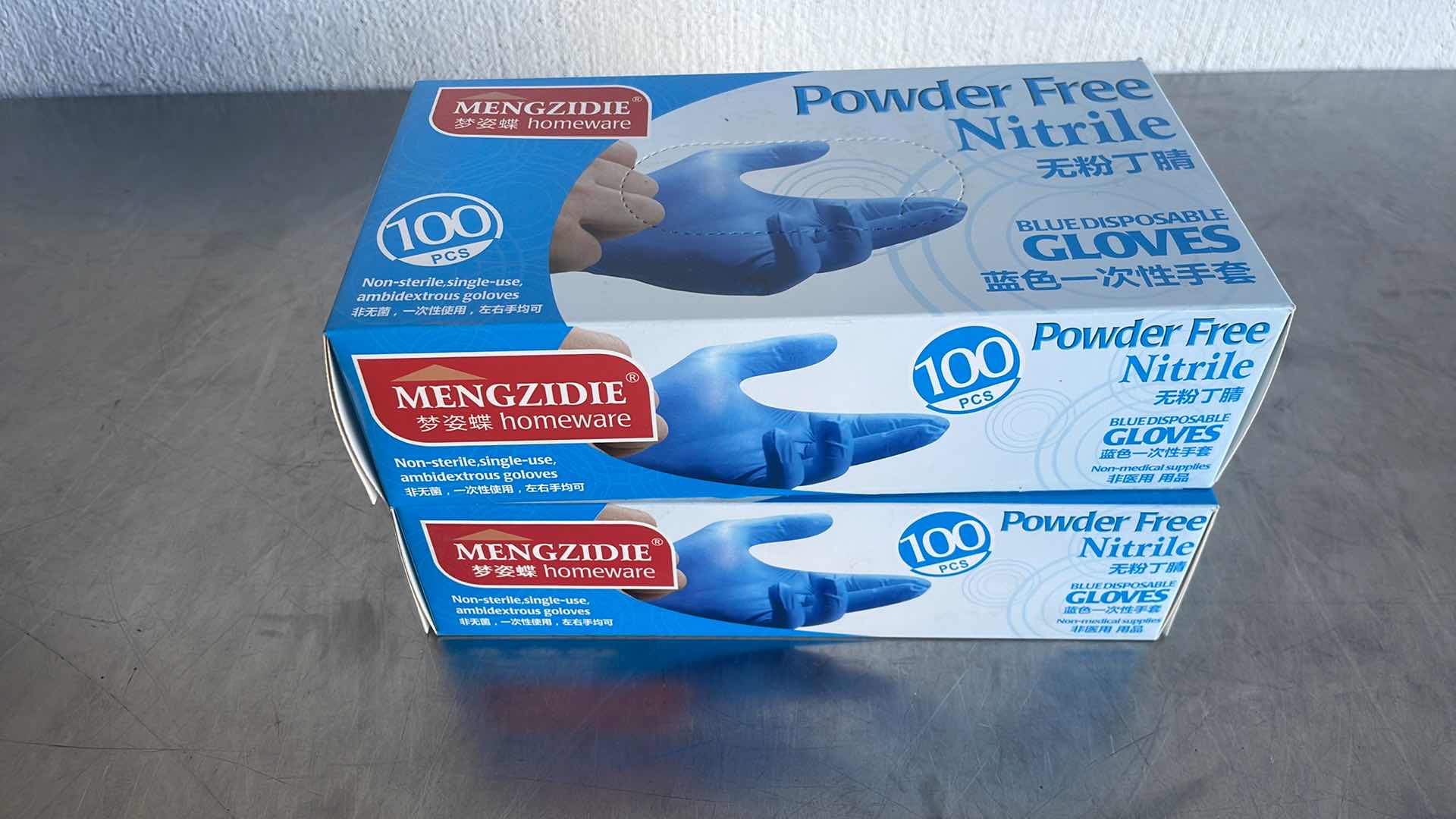 Photo 1 of NITRILE POWDER FREE BLUE DISPOSABLE GLOVES MEDIUM