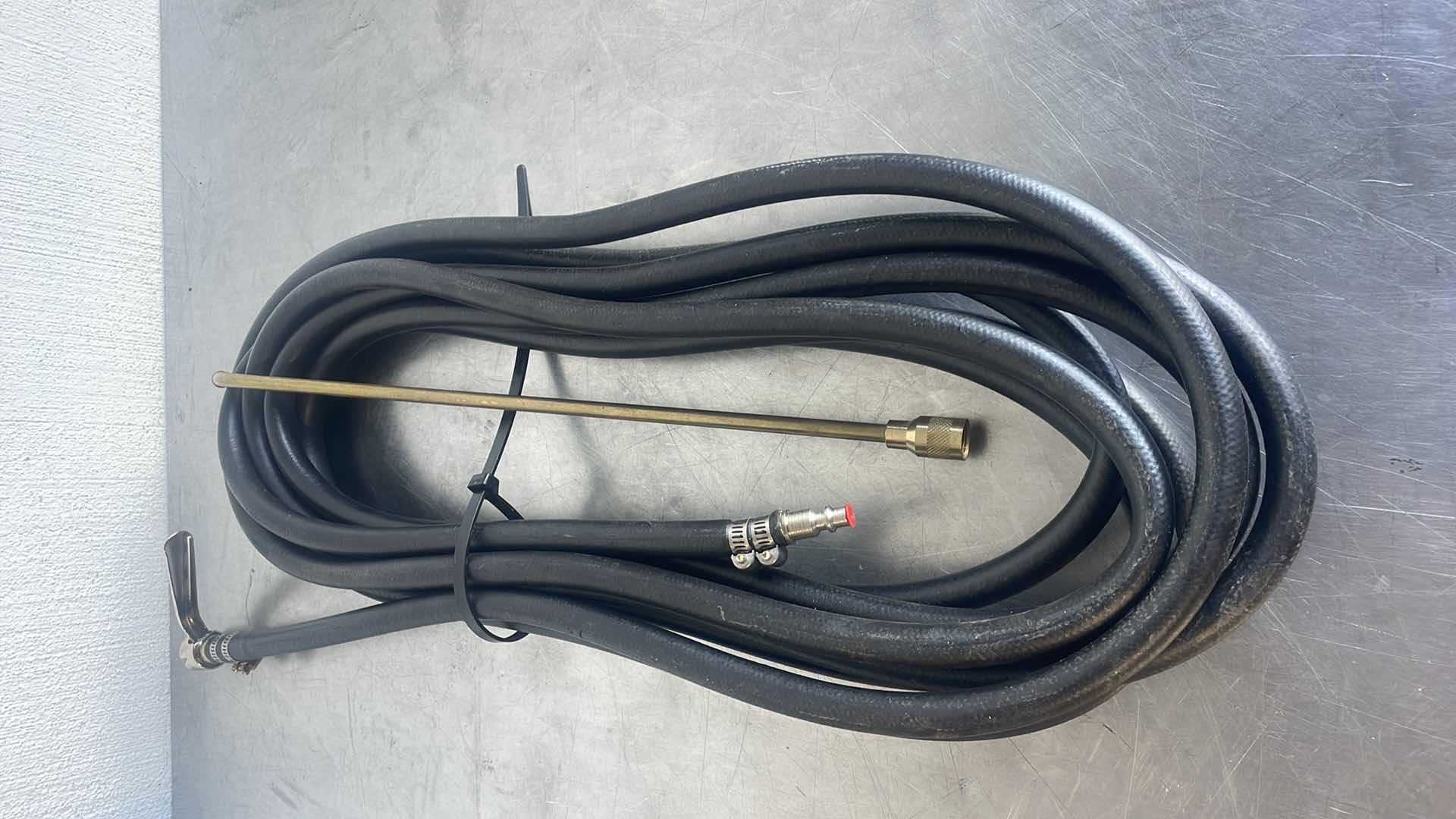 Photo 1 of 3/8" X 25 Ft. PARKER 300 Psi WASH DOWN HOSE ASSEMBLY W/ BRASS WAND &
COUPLER