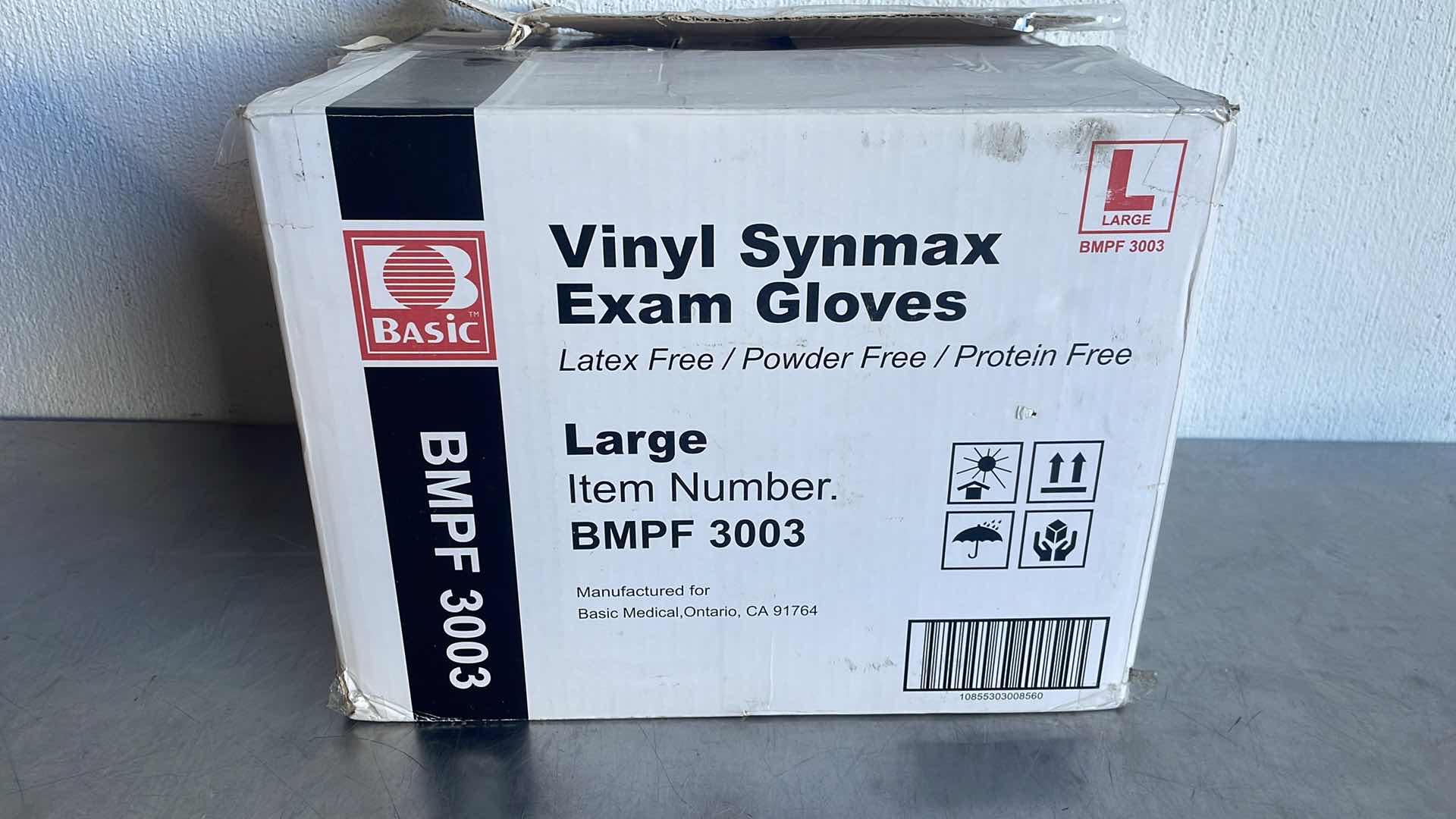 Photo 1 of BASIC LARGE VINYL SYNMAX
EXAM GLOVES 10 BOXES OF 100