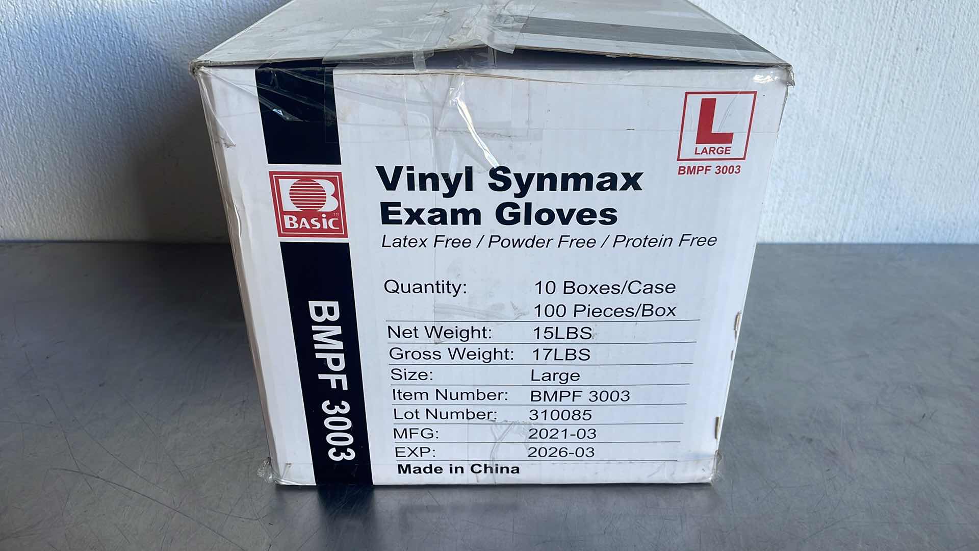 Photo 2 of BASIC LARGE VINYL SYNMAX
EXAM GLOVES 10 BOXES OF 100