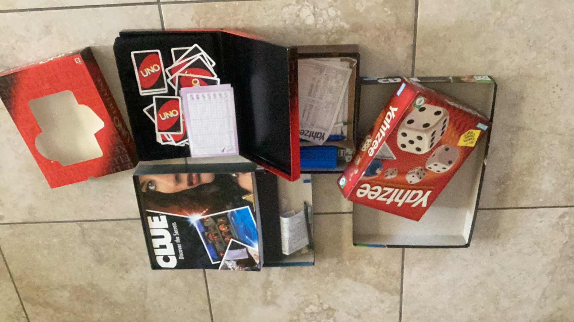 Photo 2 of CLUE, YAHTZEE, AND UNO GAMES