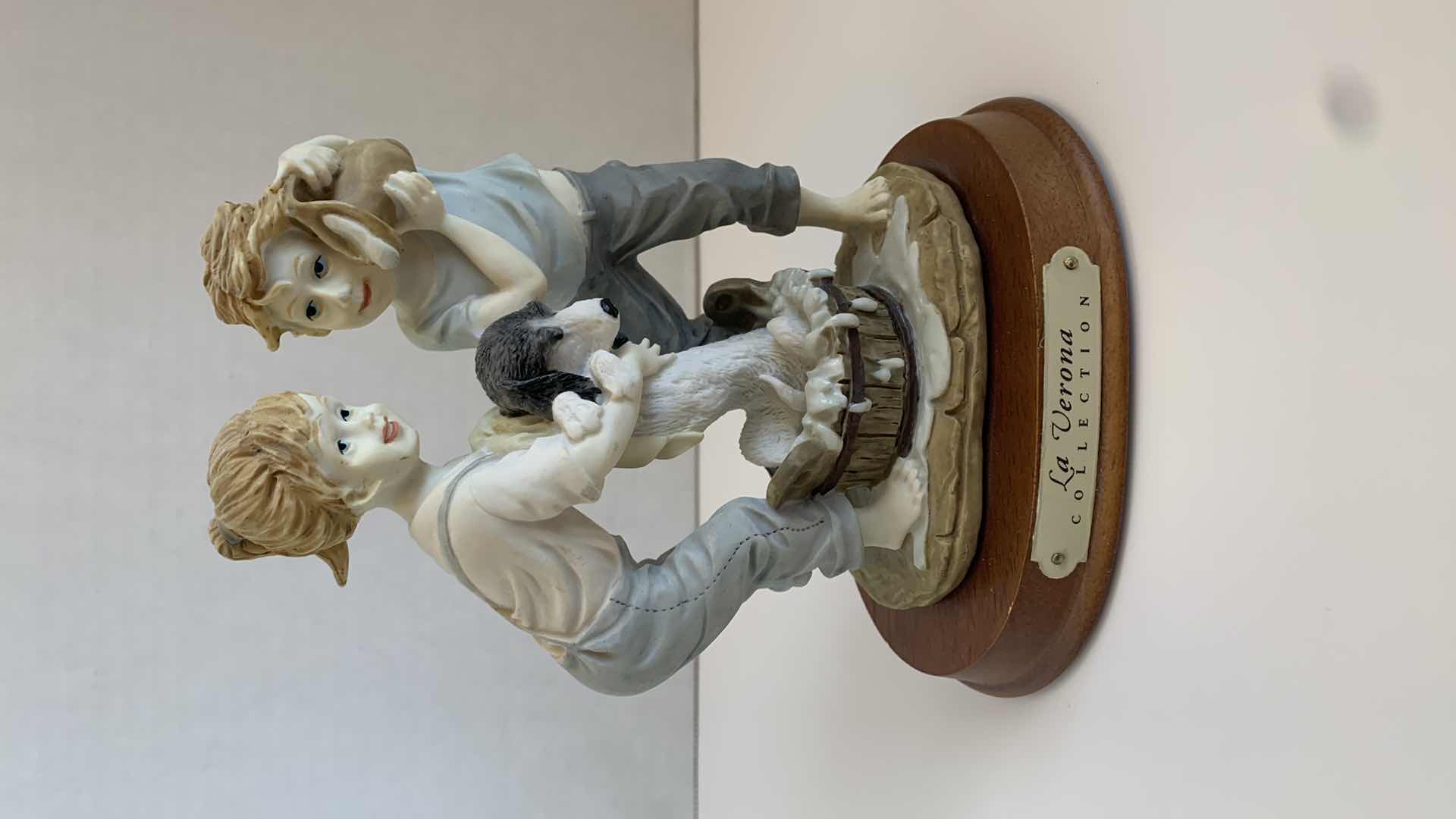 Photo 1 of LA VERONA COLLECTION CERAMIC GIRL AND BOY WASHING DOG STATUE