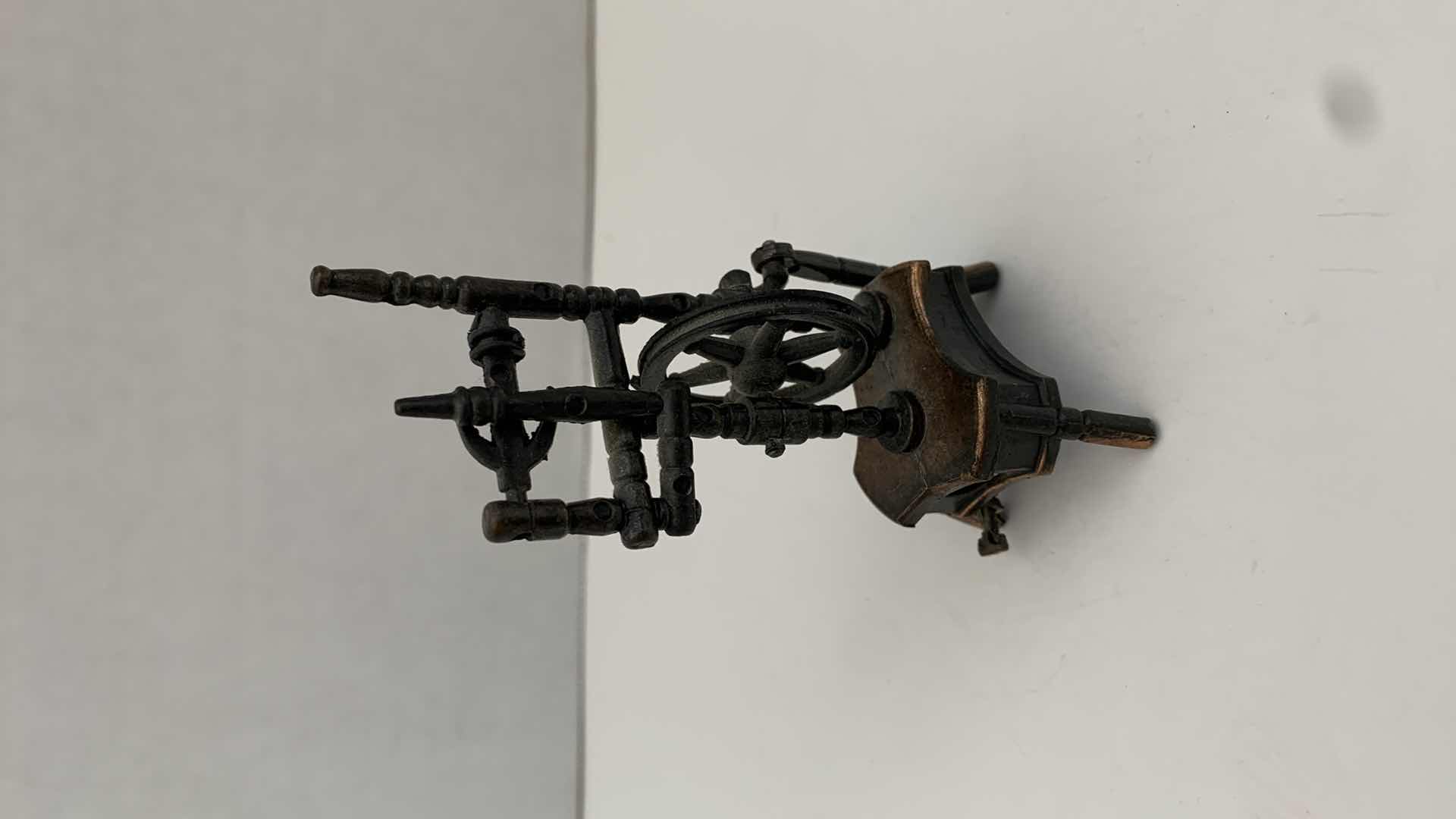 Photo 3 of SET OF 2 METAL STATUES: SPINNING WHEEL PENCIL SHARPENER AND CLOTHING MANGLE TALLEST 4"