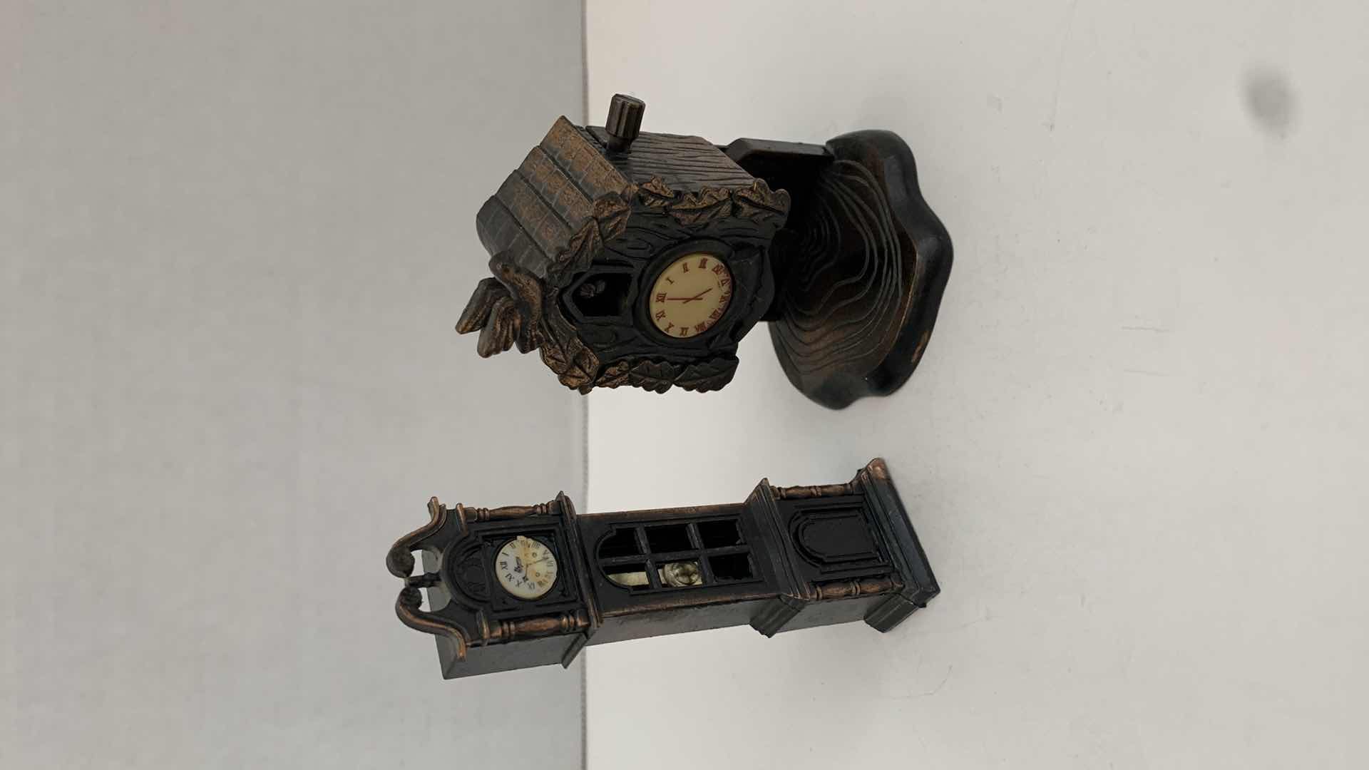 Photo 1 of SET OF 2 METAL STATUES: GRANDFATHER CLOCK PENCIL SHARPENER AND CUCKOO CLOCK TALLEST 3.5"