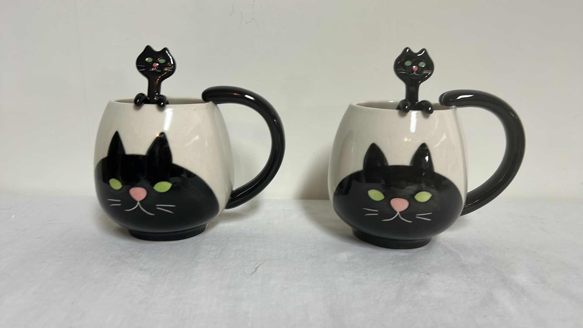 Photo 2 of TWO CAT MUGS WITH SPOONS