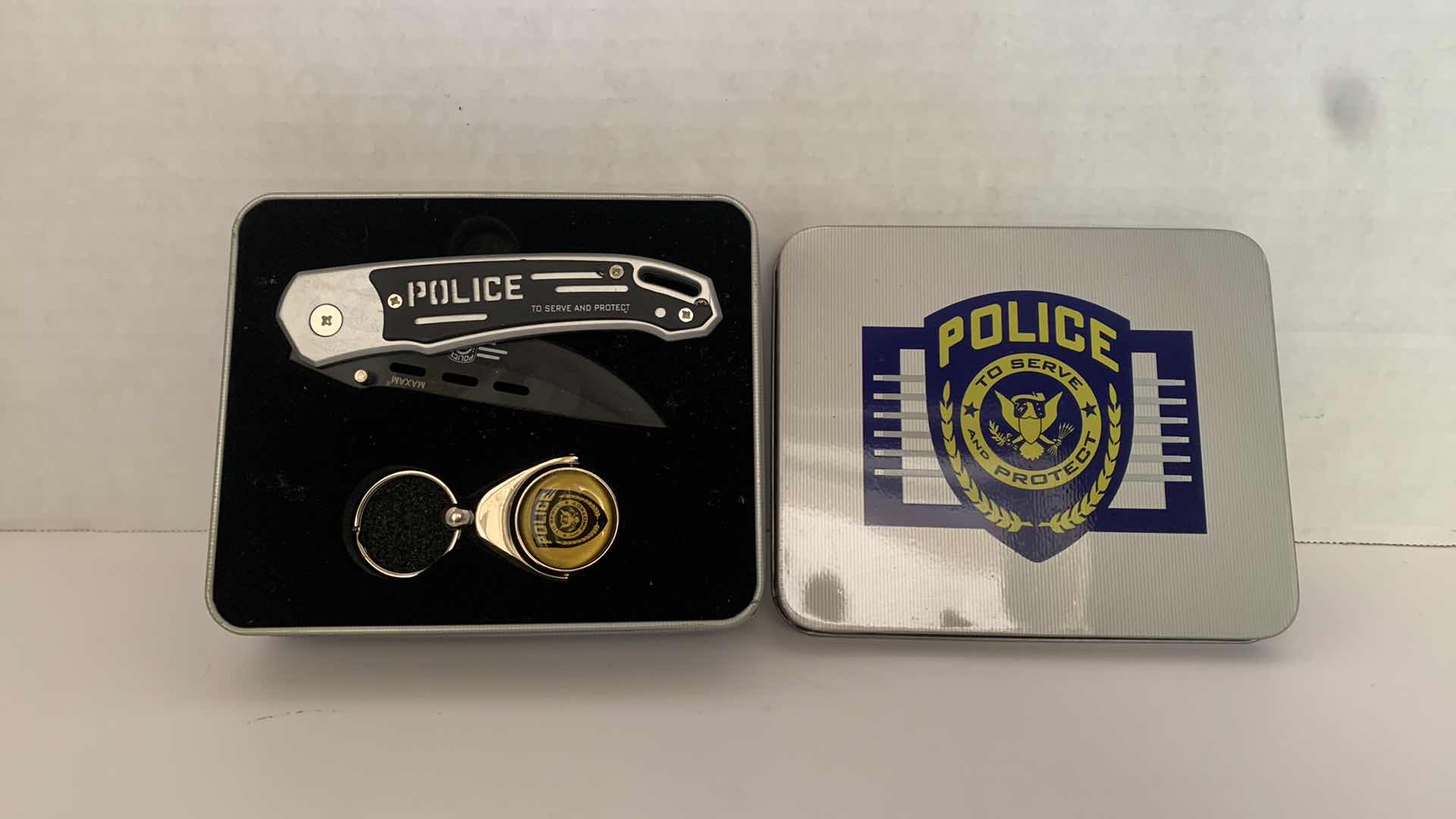 Photo 2 of SET OF 3 MAXAM LINER LOCK KNIFE AND KEY RING POLICE SETS