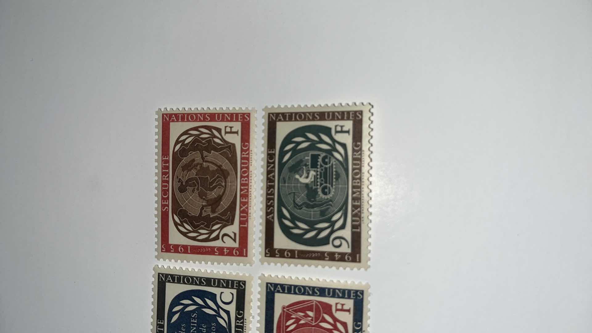 Photo 1 of LUXEMBOURG UNITED NATIONS EMBLEM 1945-1955 4 STAMPS