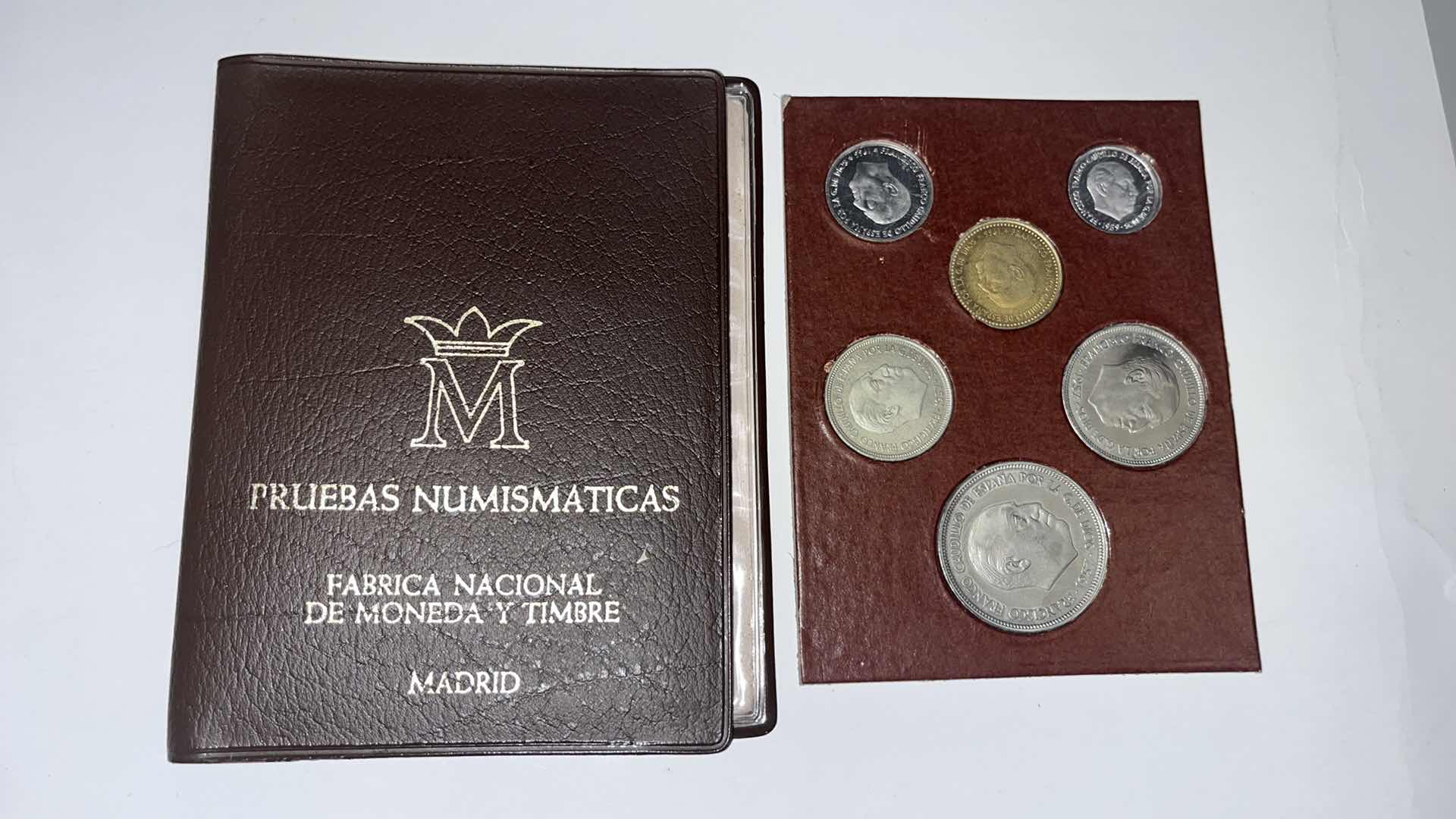 Photo 1 of NATIONAL MINT AND STAMP FACTORY VINYL SPANISH 1957 COIN SET OF 6