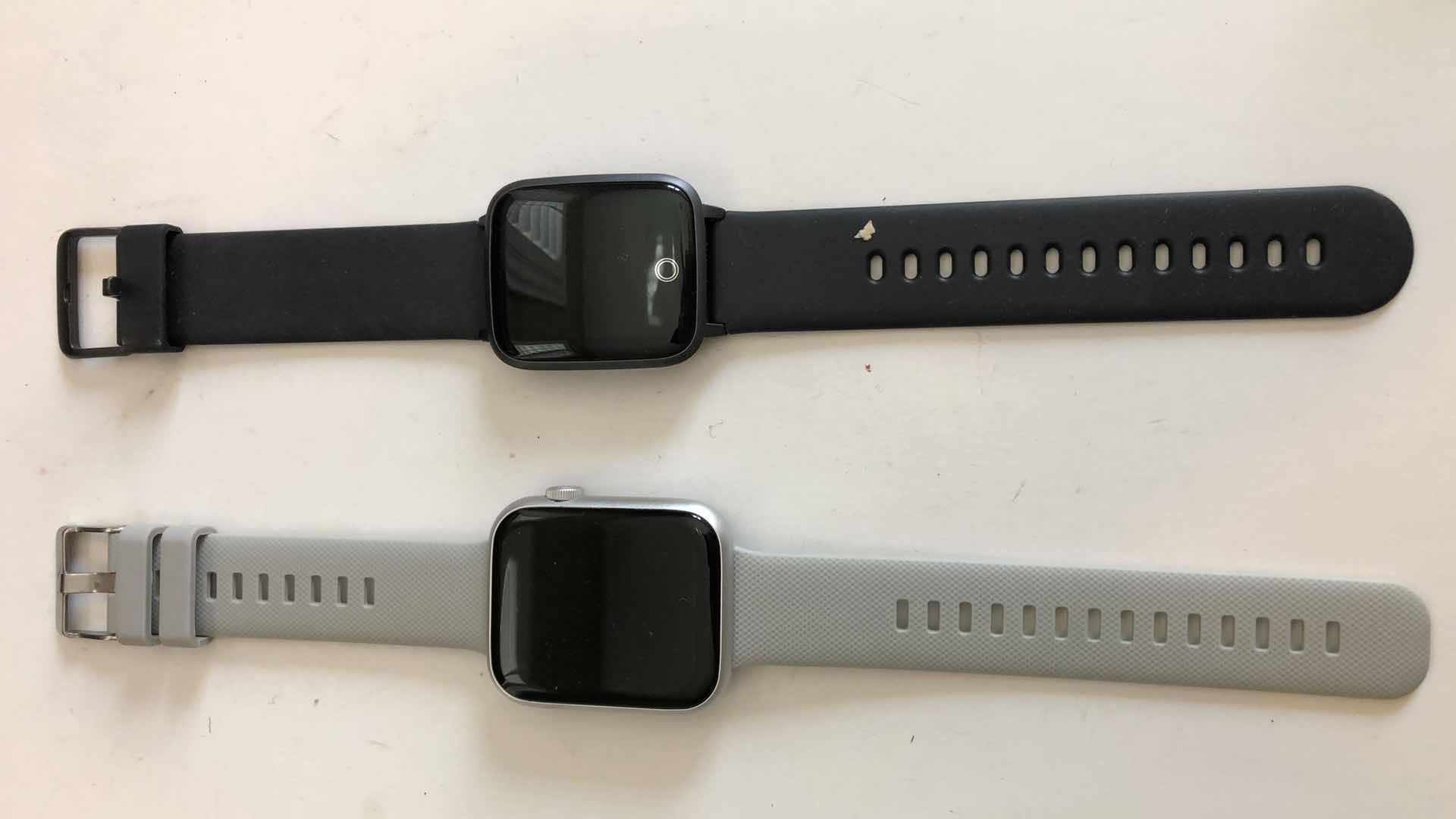 Photo 1 of PAIR OF SMART WATCHES, NO CHARGERS