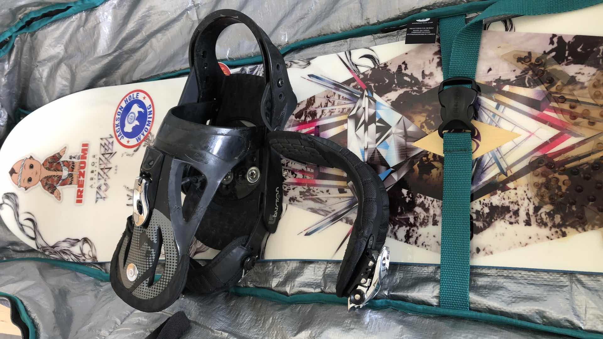 Photo 1 of THE SYSTEM ARBOR SNOWBOARD WITH CASE AND SIZE 7 BOOTS