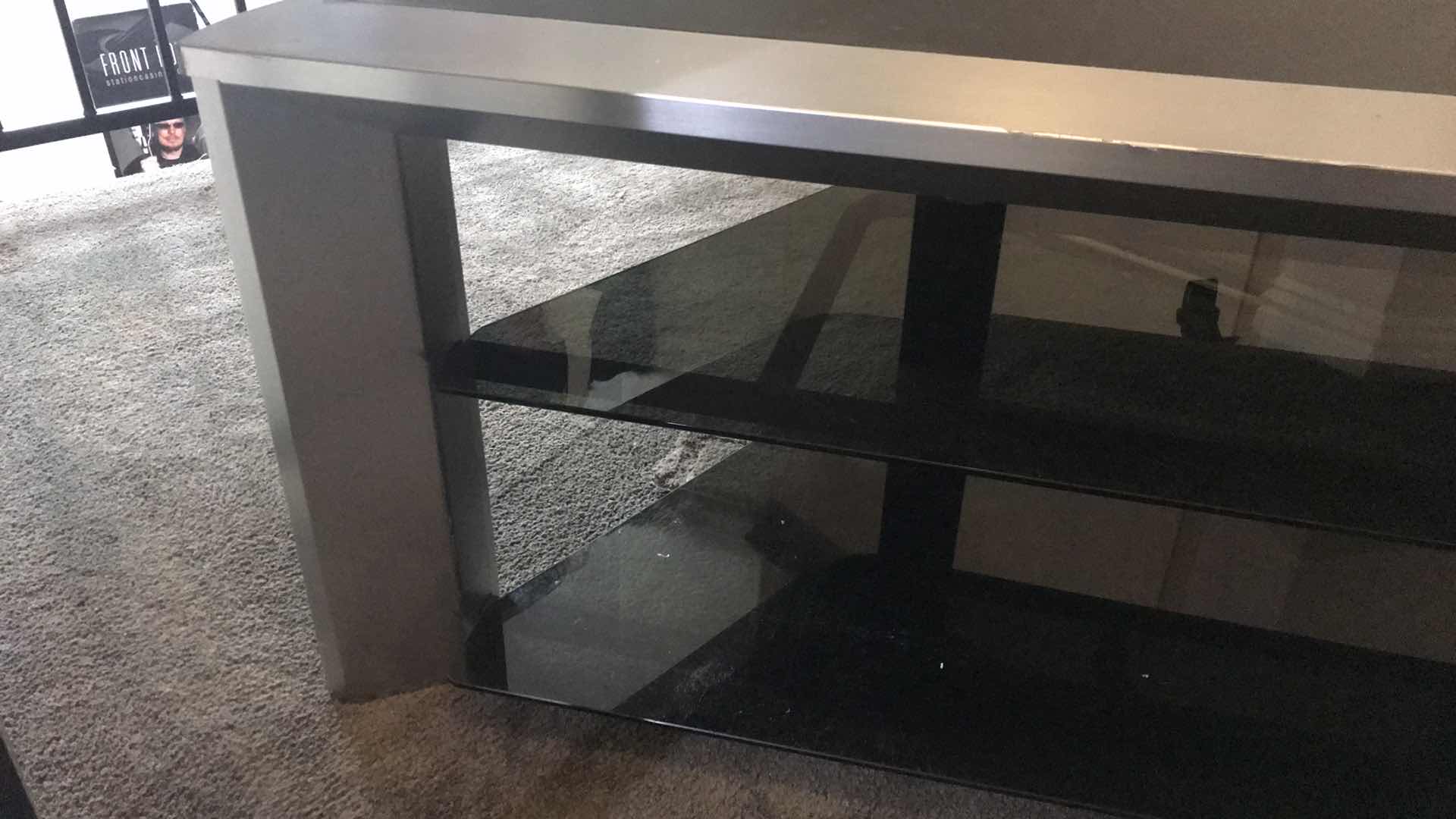 Photo 2 of TV STAND WITH SMOKE GLASS SHELVES - 51” X 21 X 18