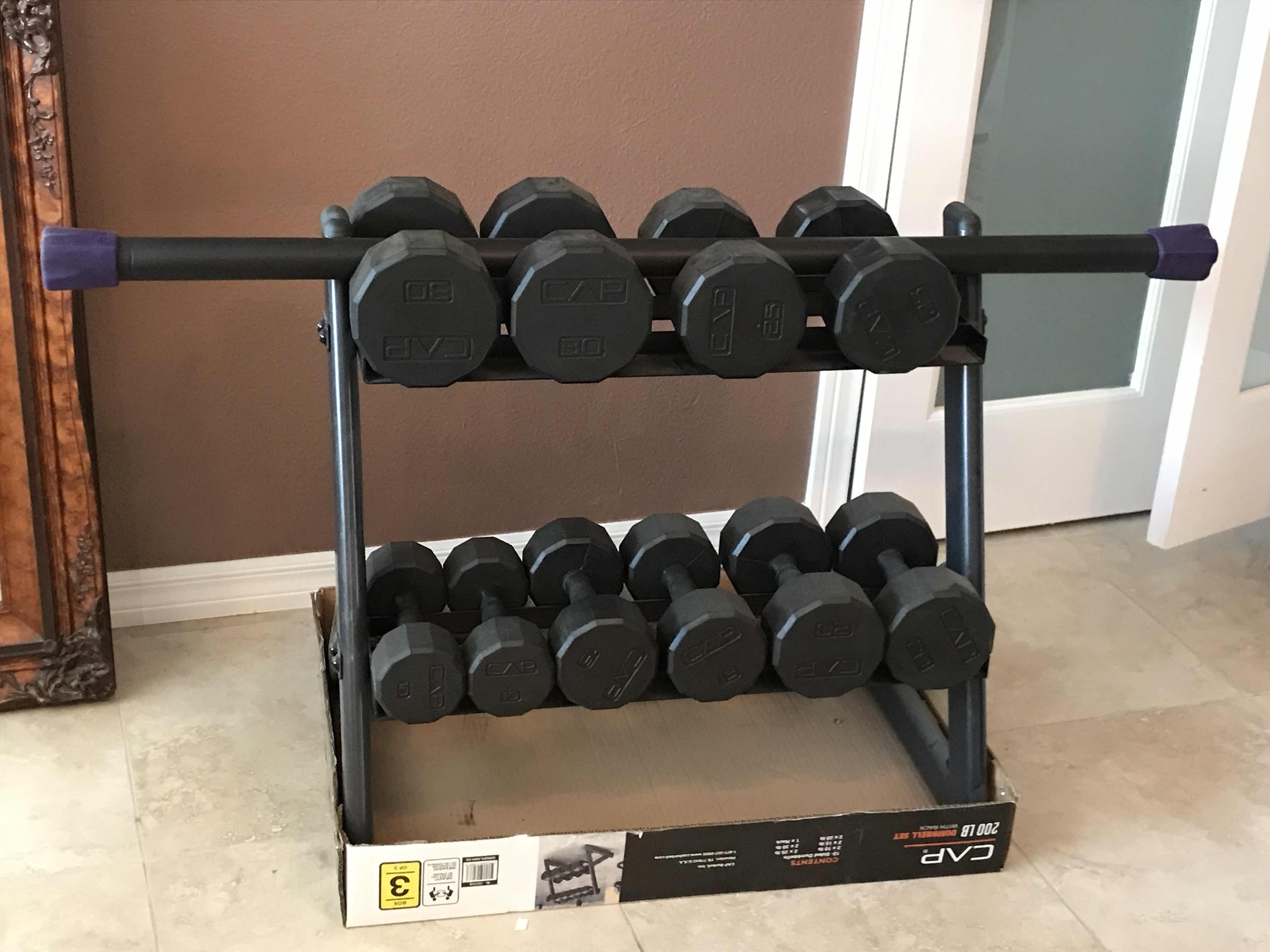 Photo 1 of CAP GYM EQUIPMENT 200LB DUMBELLS WITH STORAGE RACK