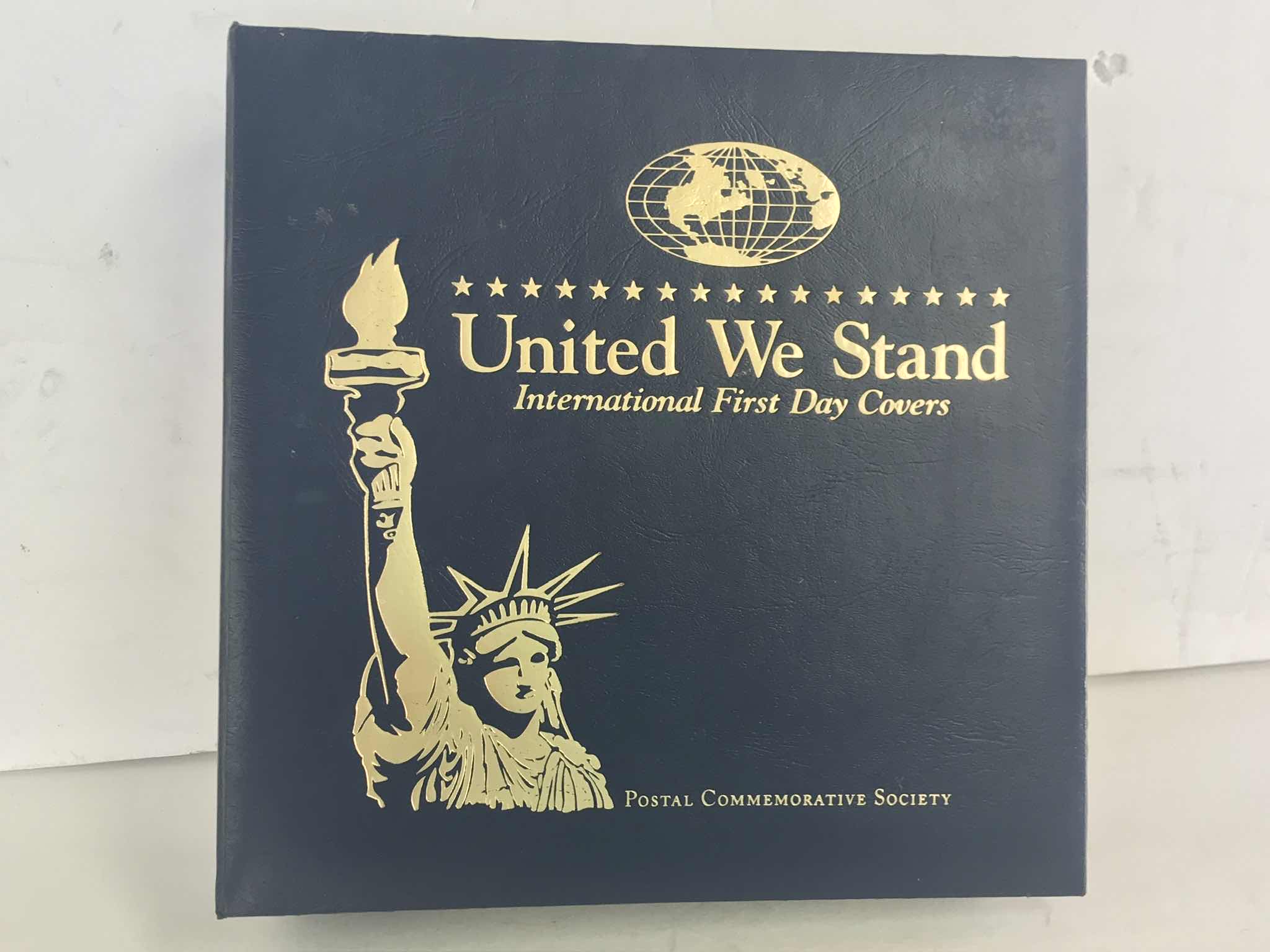 Photo 1 of POSTAL COMMEMORATIVE SOCIETY “UNITED WE STAND INTERNATIONAL FIRST DAY COVERS” STAMPS