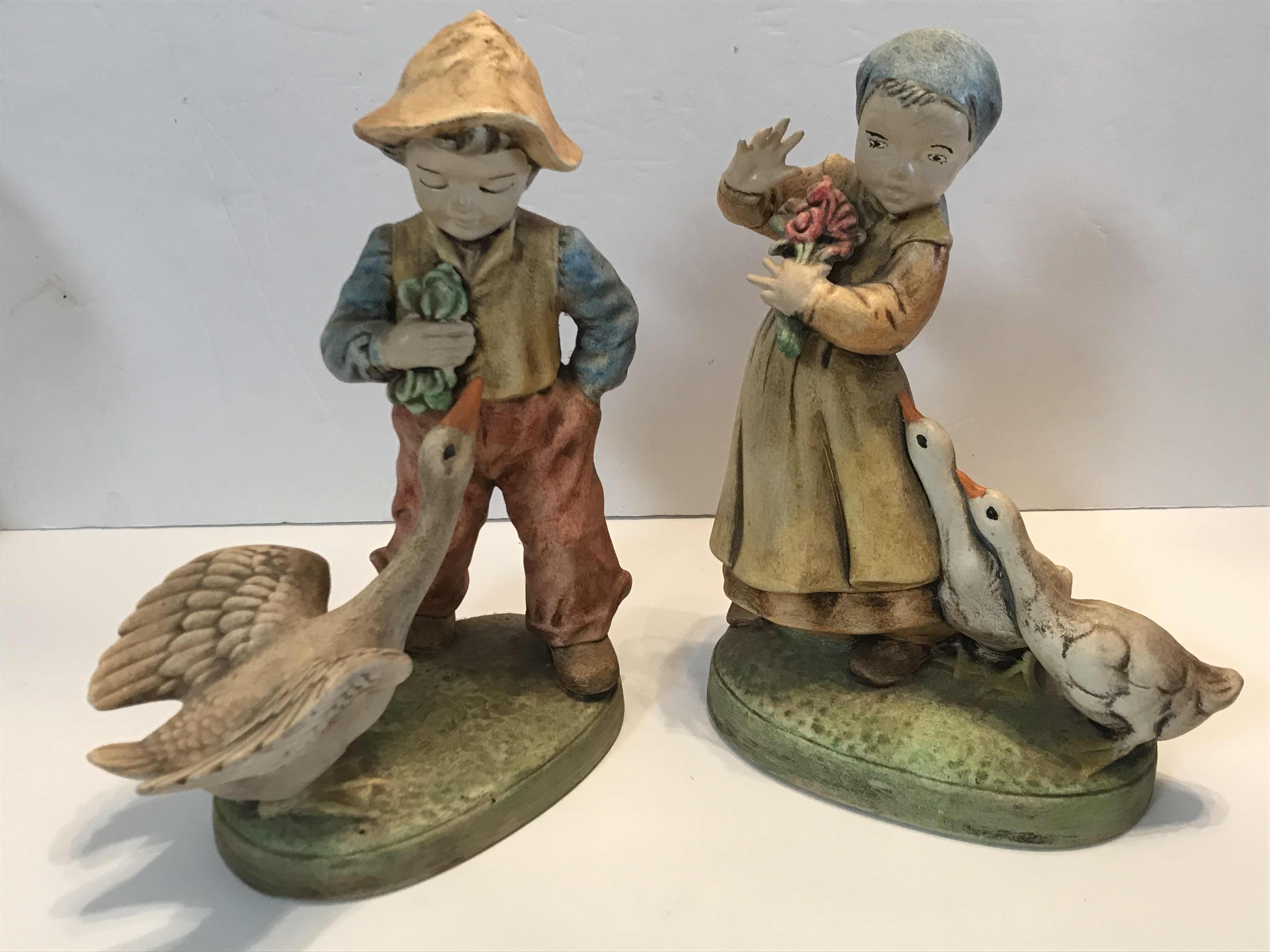Photo 1 of VINTAGE HOLLAND MOLD GIRL & BOY HANDCRAFTED CERAMIC FIGURINES H-9”