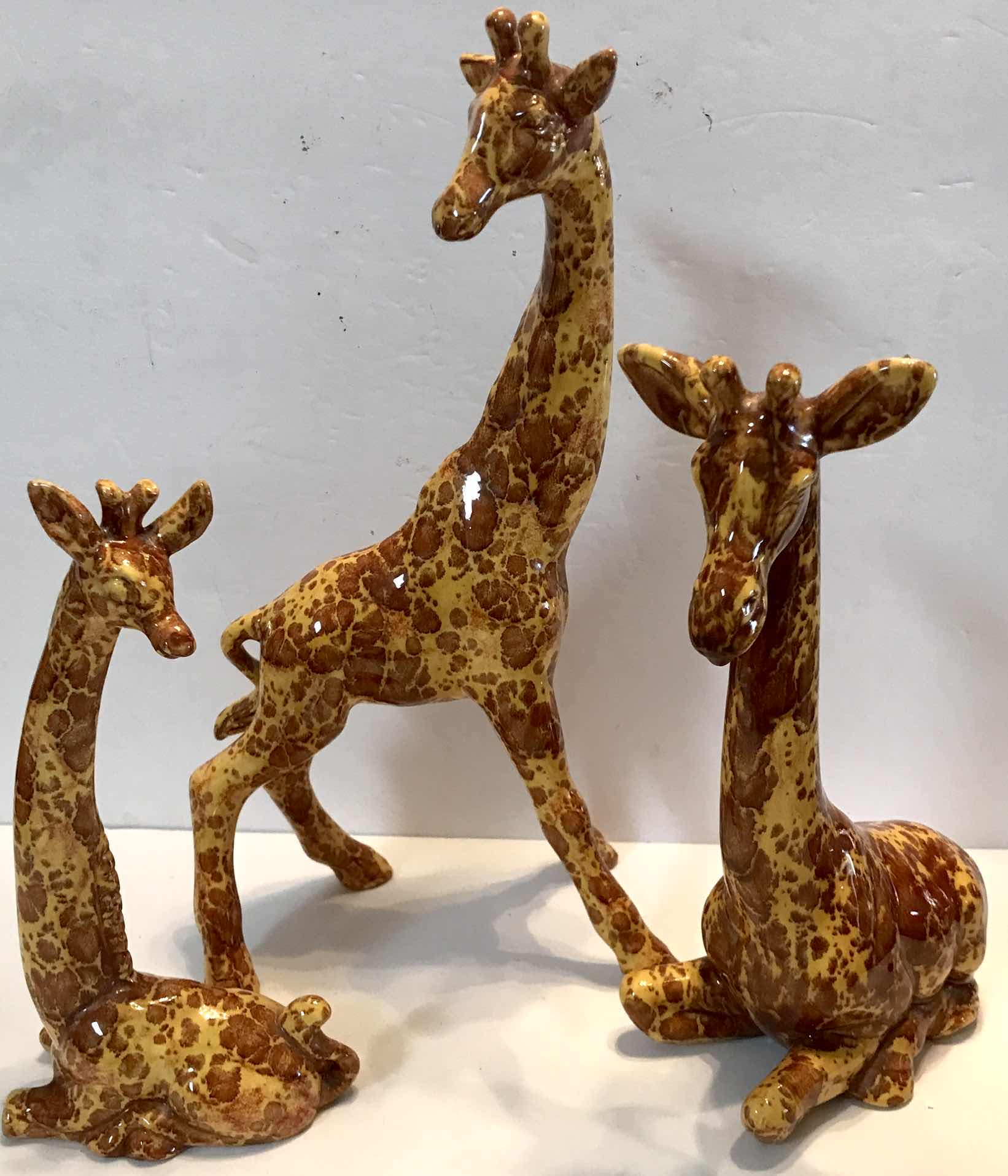 Photo 1 of VINTAGE HANDCRAFTED CERAMIC FAMILY OF GIRAFFES- TALLEST H-15”
