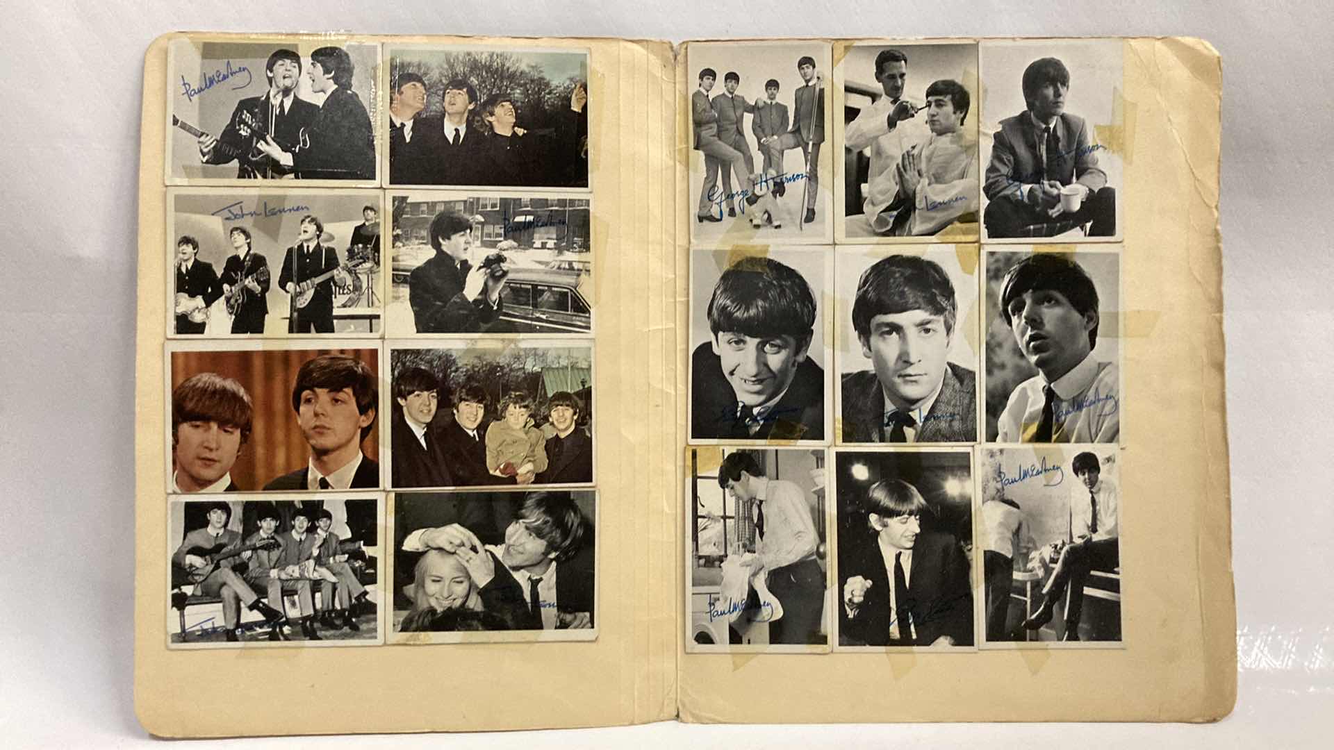 Photo 1 of BEATLES PHOTO COLLAGE AUTOGRAPHED BY BEATLES ATTACHED TO FOLDER