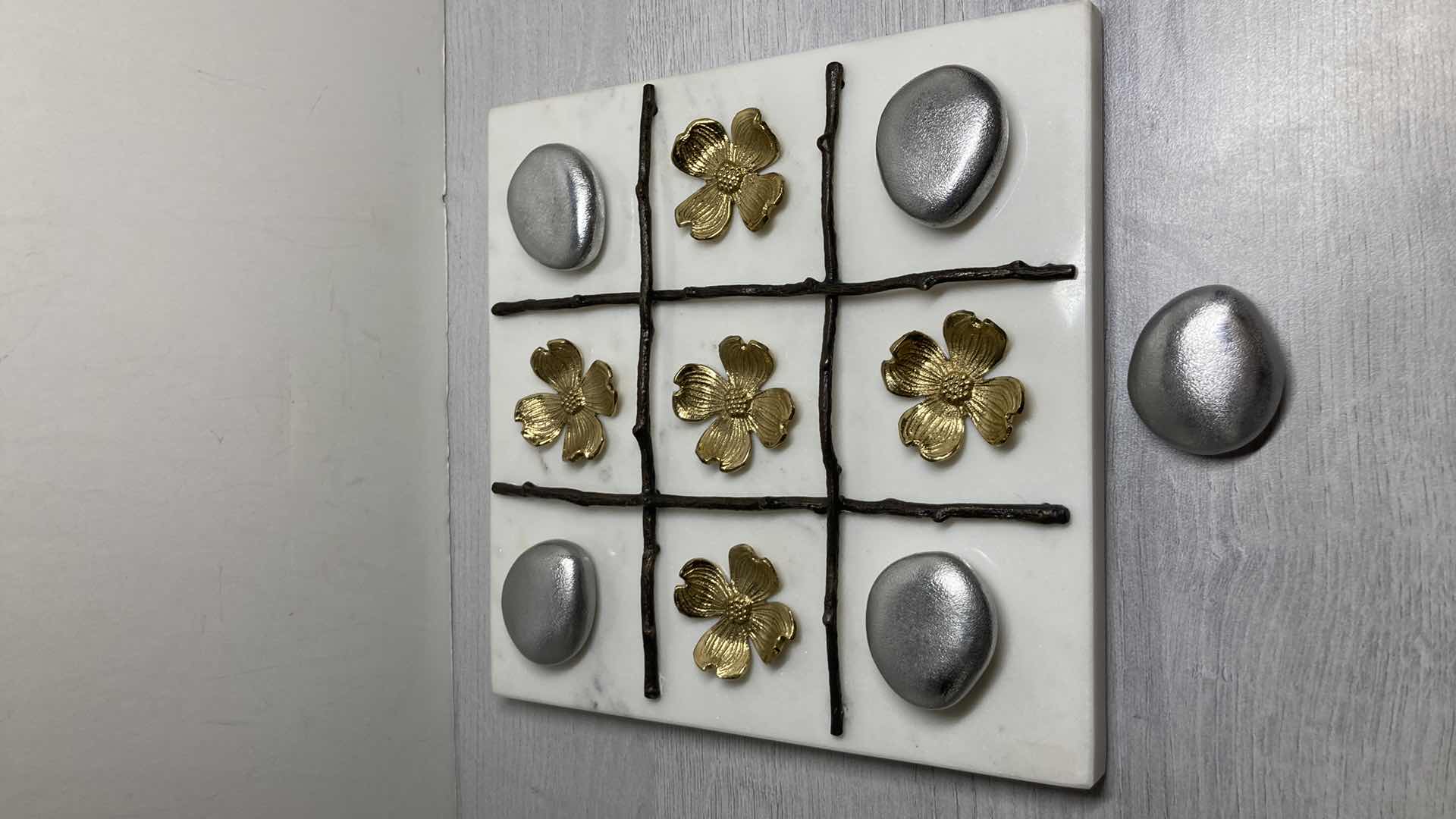 Photo 1 of MICHAEL ARAM DOGWOOD TIC TAC TOE W BRASS & ALUMINUM PIECES 9” X 9” H1”