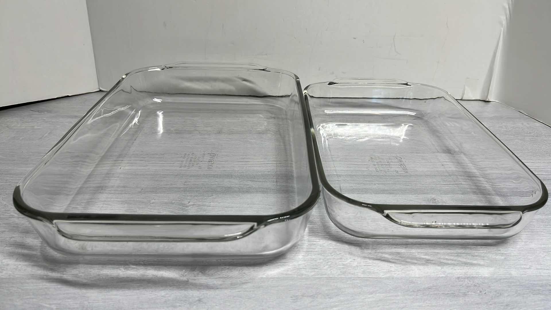 Photo 2 of PYREX CLEAR RECTANGULAR BAKING DISHES W HANDLES 2QT & 3QT (2)