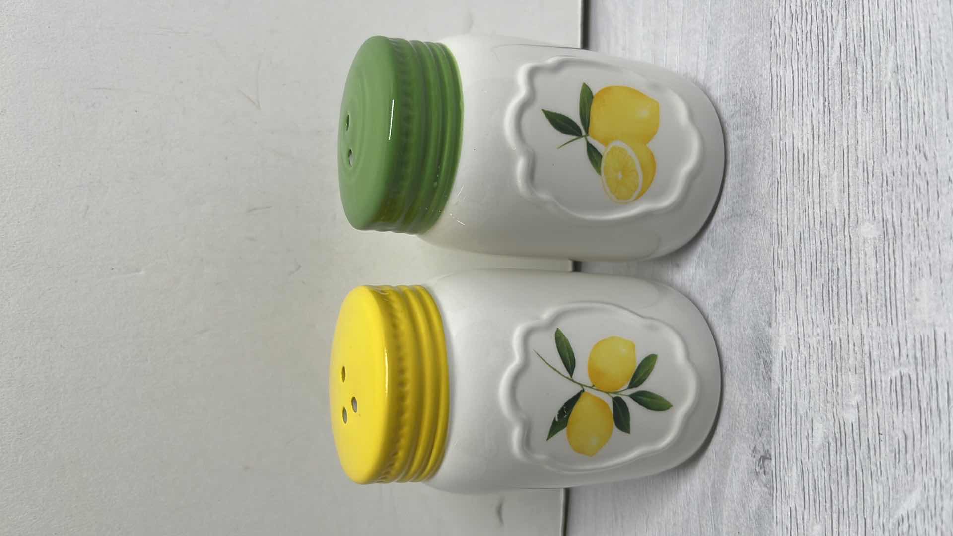 Photo 2 of LEMON DECOR SALT & PEPPER SHAKERS & 2 PACKS OF CASPARI CITRON 3-PLY NAPKINS (15 CT PER PACK)