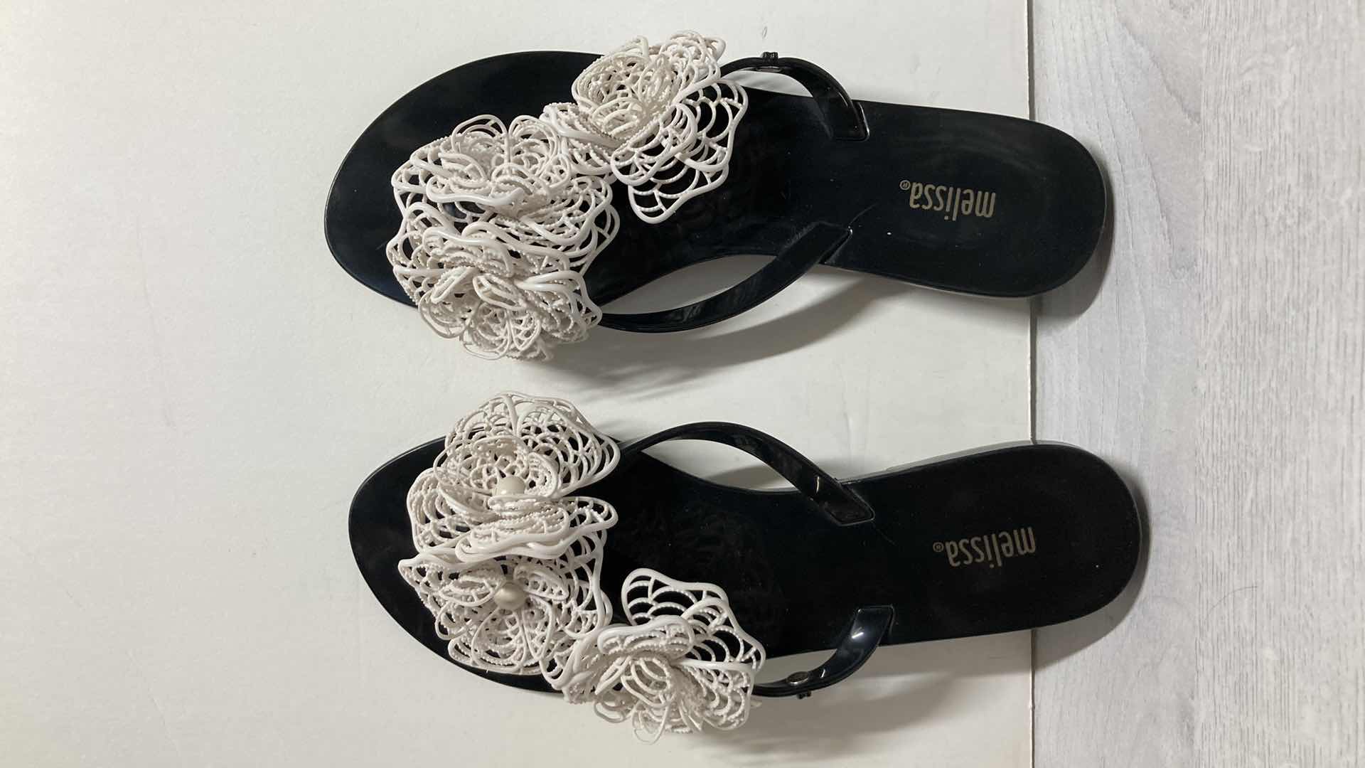 Photo 1 of MELISSA BLACK & WHITE FLORAL RUBBER SANDALS SIZE US 8