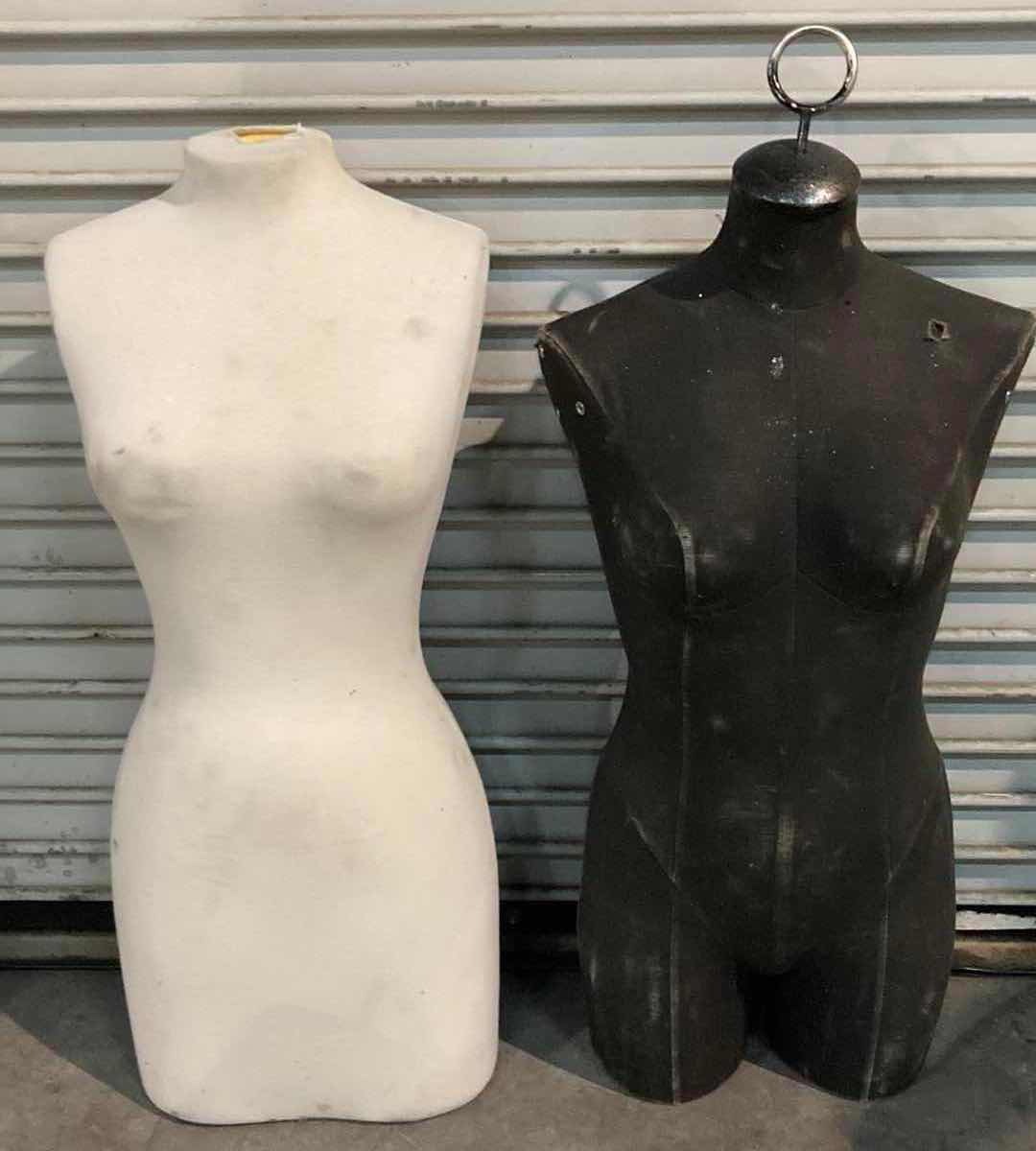 Photo 1 of FEMALE MANNEQUIN BLACK & WHITE FOAM TORSO W FABRIC SLEEVE 15” X 36”