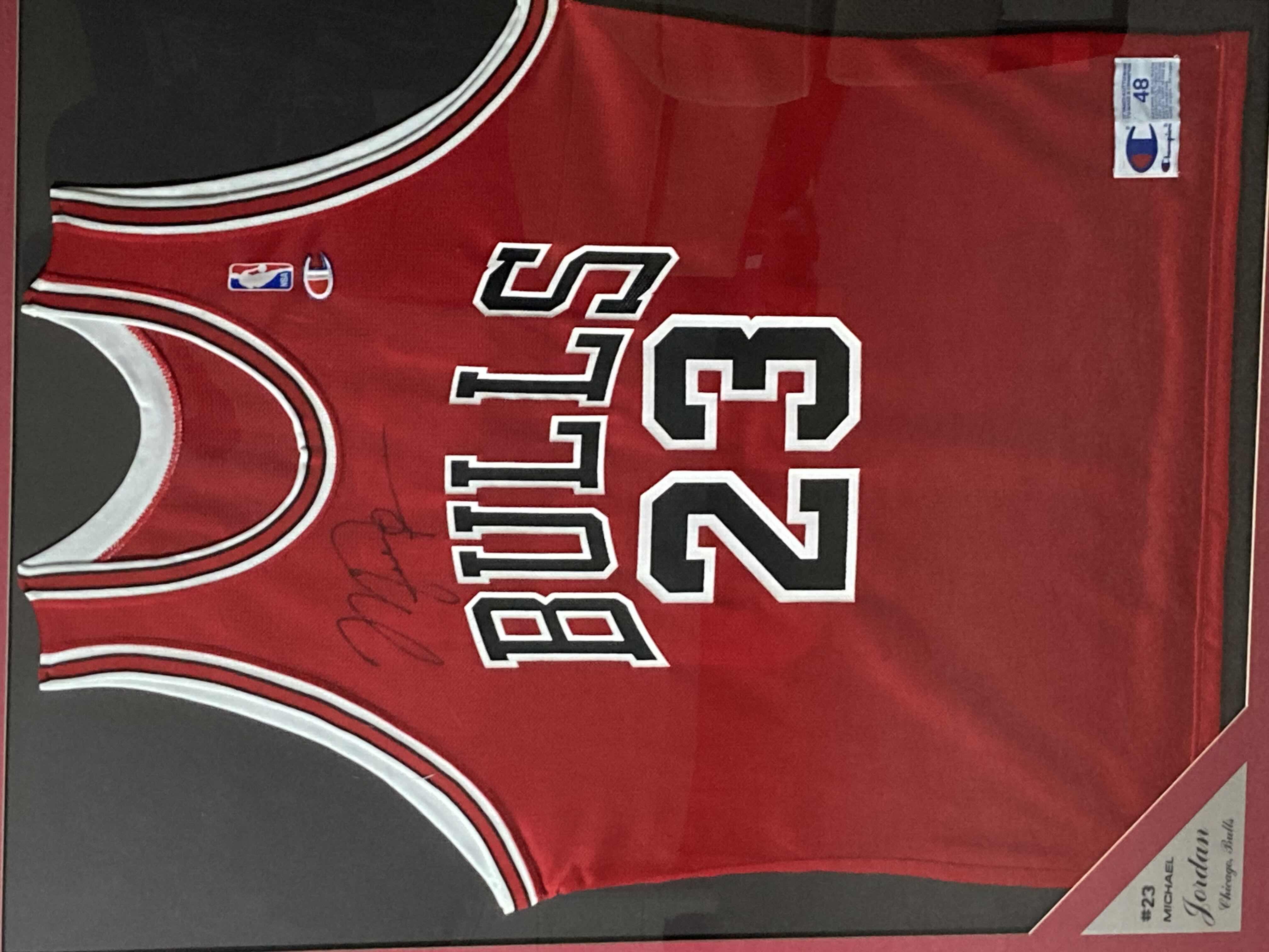 Photo 2 of MICHAEL JORDAN BULLS #23 FRAMED JERSEY AUTOGRAPHED BY MICHAEL JORDAN 35.5” X 43.5”