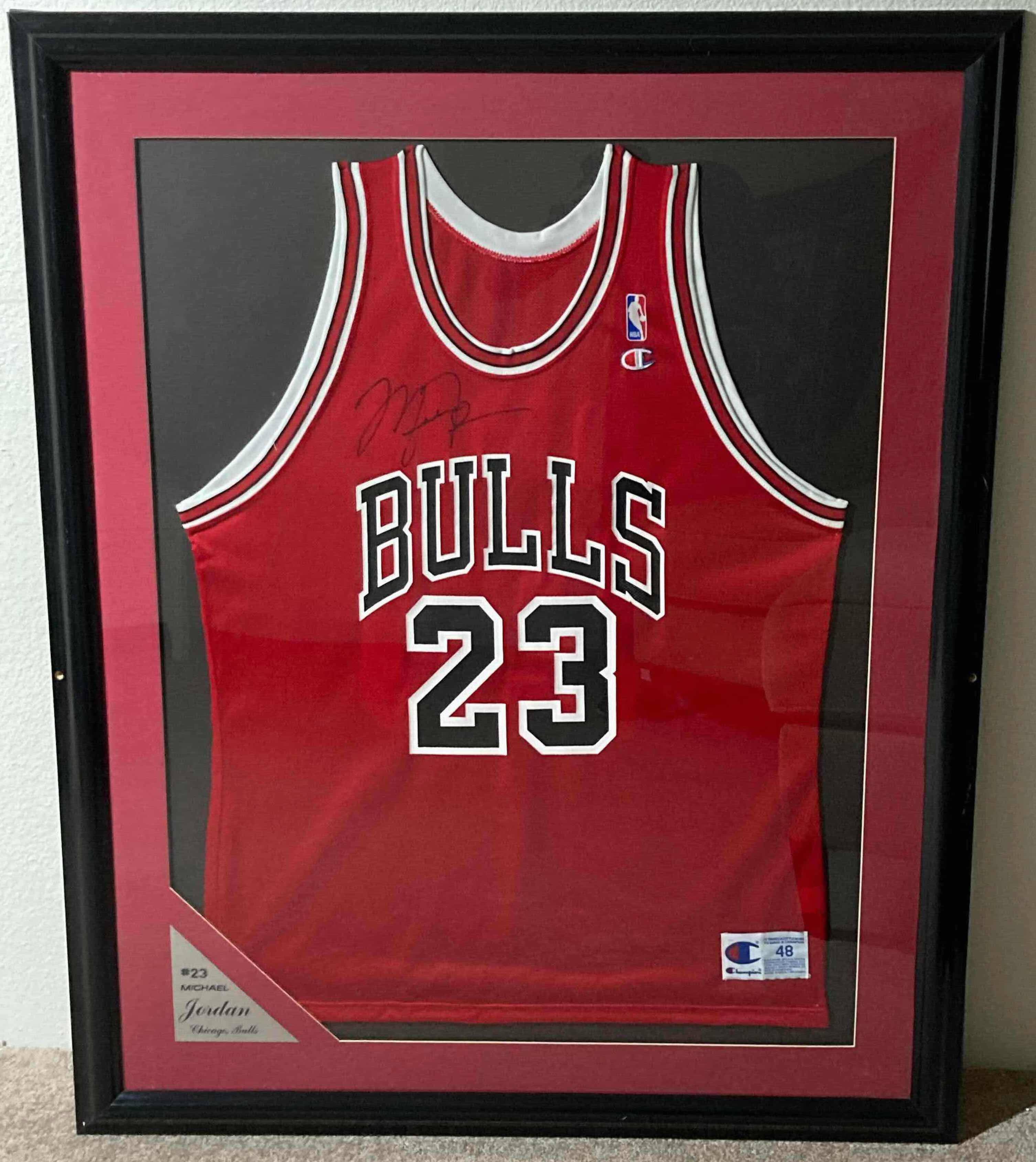 Photo 1 of MICHAEL JORDAN BULLS #23 FRAMED JERSEY AUTOGRAPHED BY MICHAEL JORDAN 35.5” X 43.5”