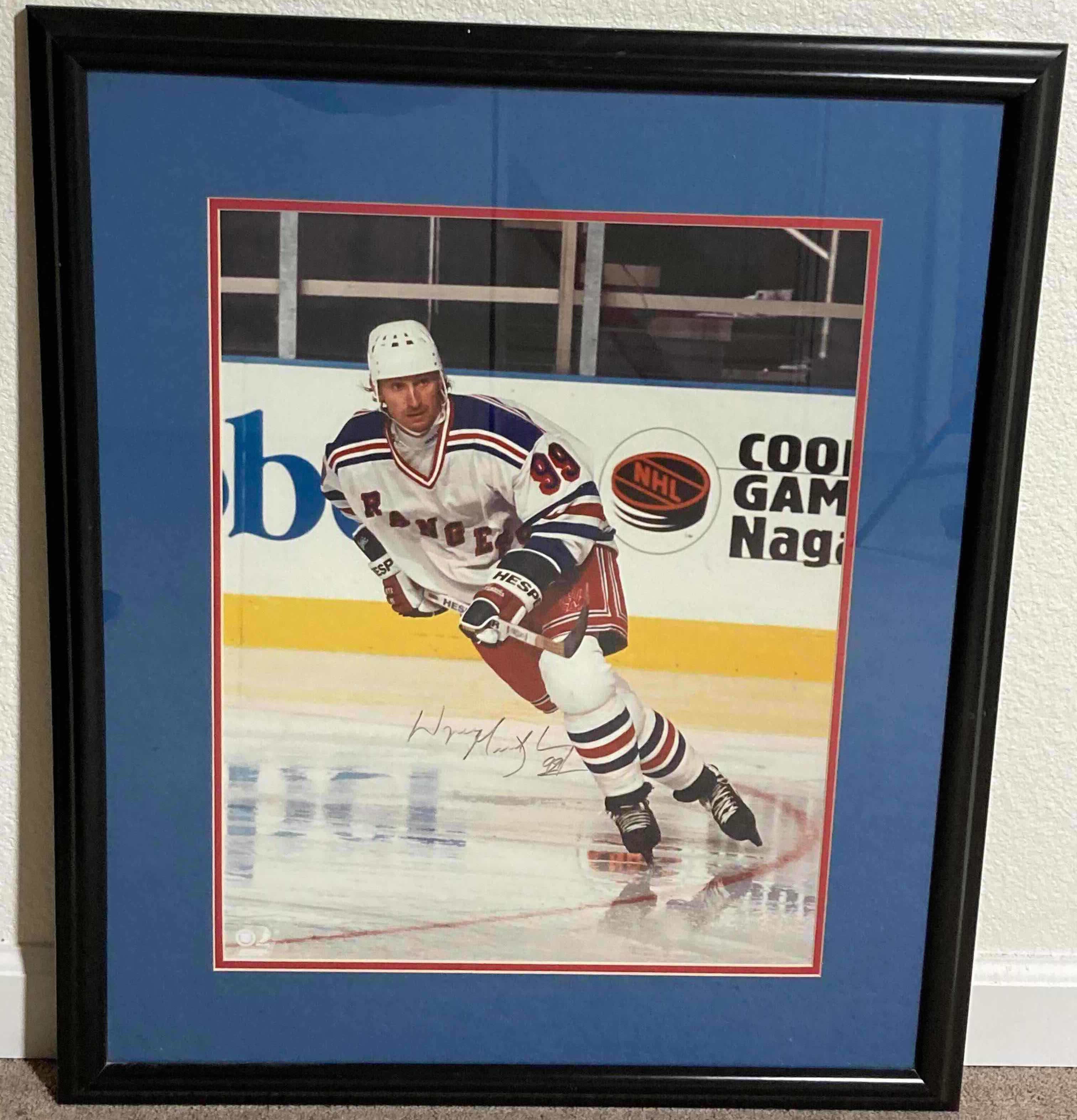 Photo 1 of WAYNE GRETZKY RANGERS #99 FRAMED PHOTOGRAPH AUTOGRAPHED BY WAYNE GRETZKY NO COA 24” X 28”