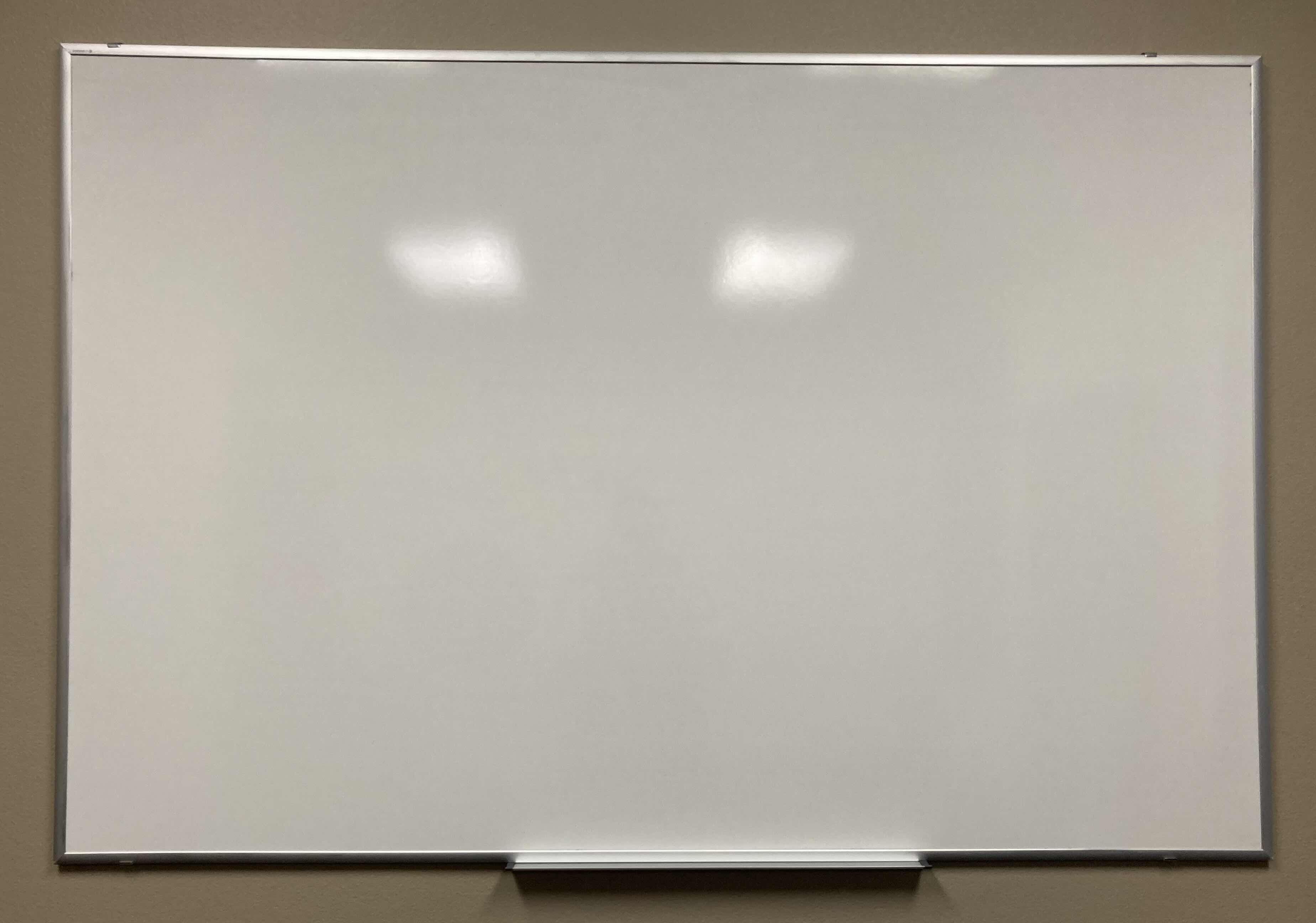 Photo 1 of DRY ERASE WHITE BOARD 70” X 47”