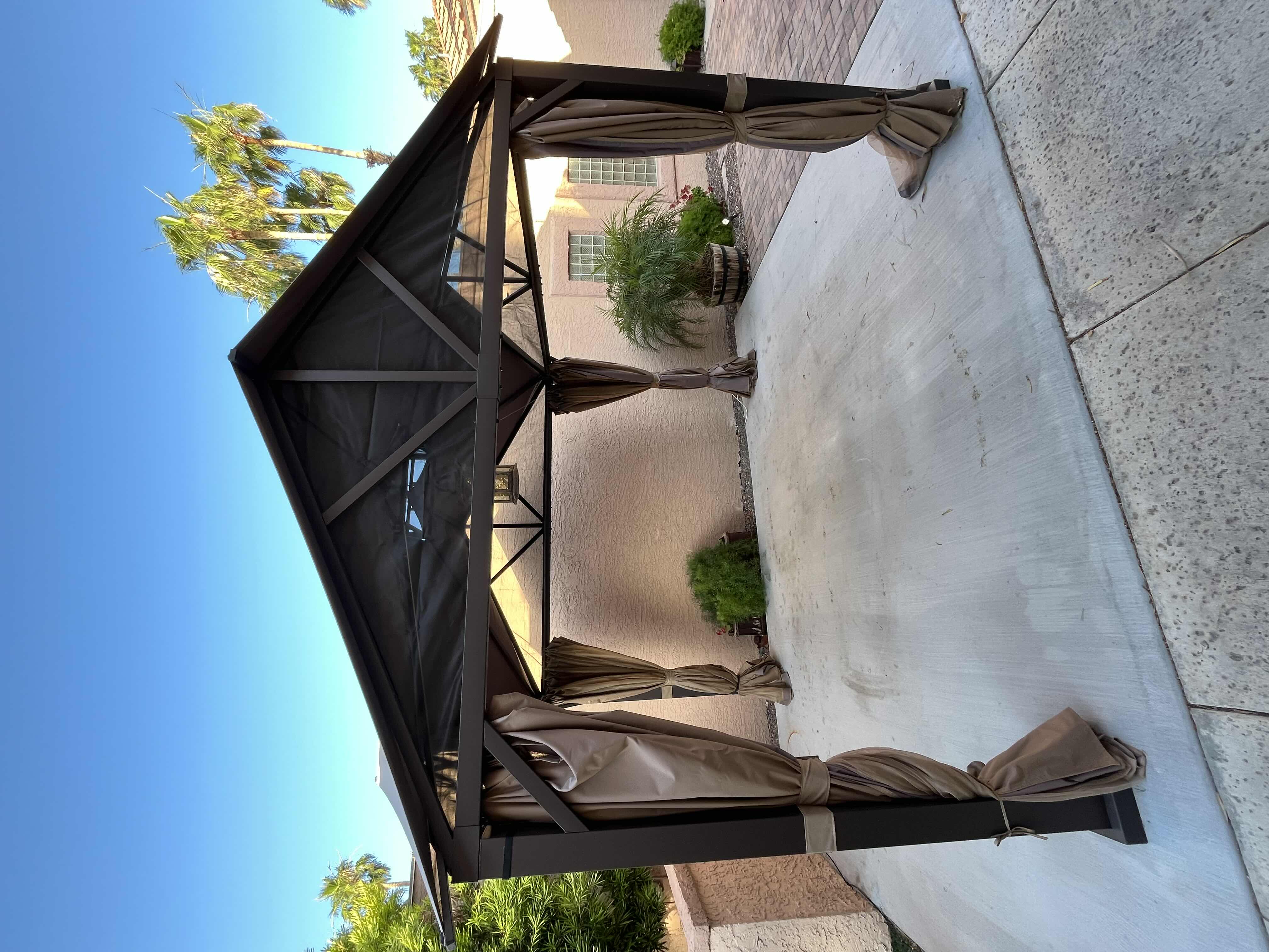 Photo 2 of BLACK STEEL FRAMED GAZEBO PATIO TENT W PRIVACY CURTAINS 124” X 122.5” H132” (READ NOTES)