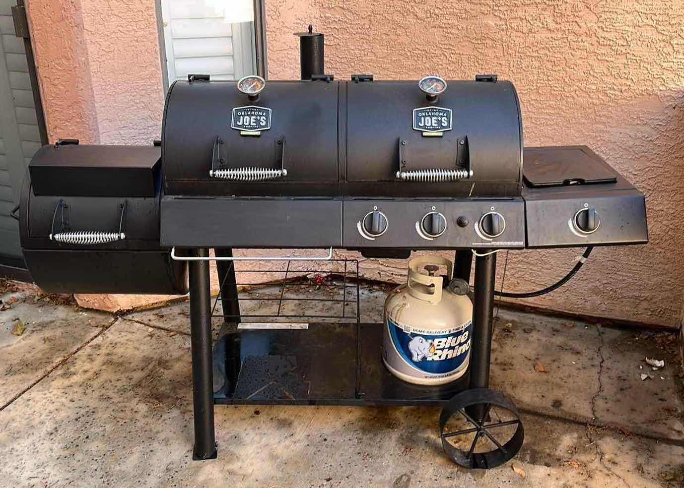 Photo 1 of OKLAHOMA JOE’S SMOKERS BLACK LONGHORN COMBO 3 BURNER CHARCOAL & PROPANE GAS SMOKER BBQ GRILL MODEL 15202029 1,060sq.in. COOKING SPACE W COVER, BLUE RHINO 15LB PROPANE TANK & GRILLING ACCESSORIES (READ NOTES)