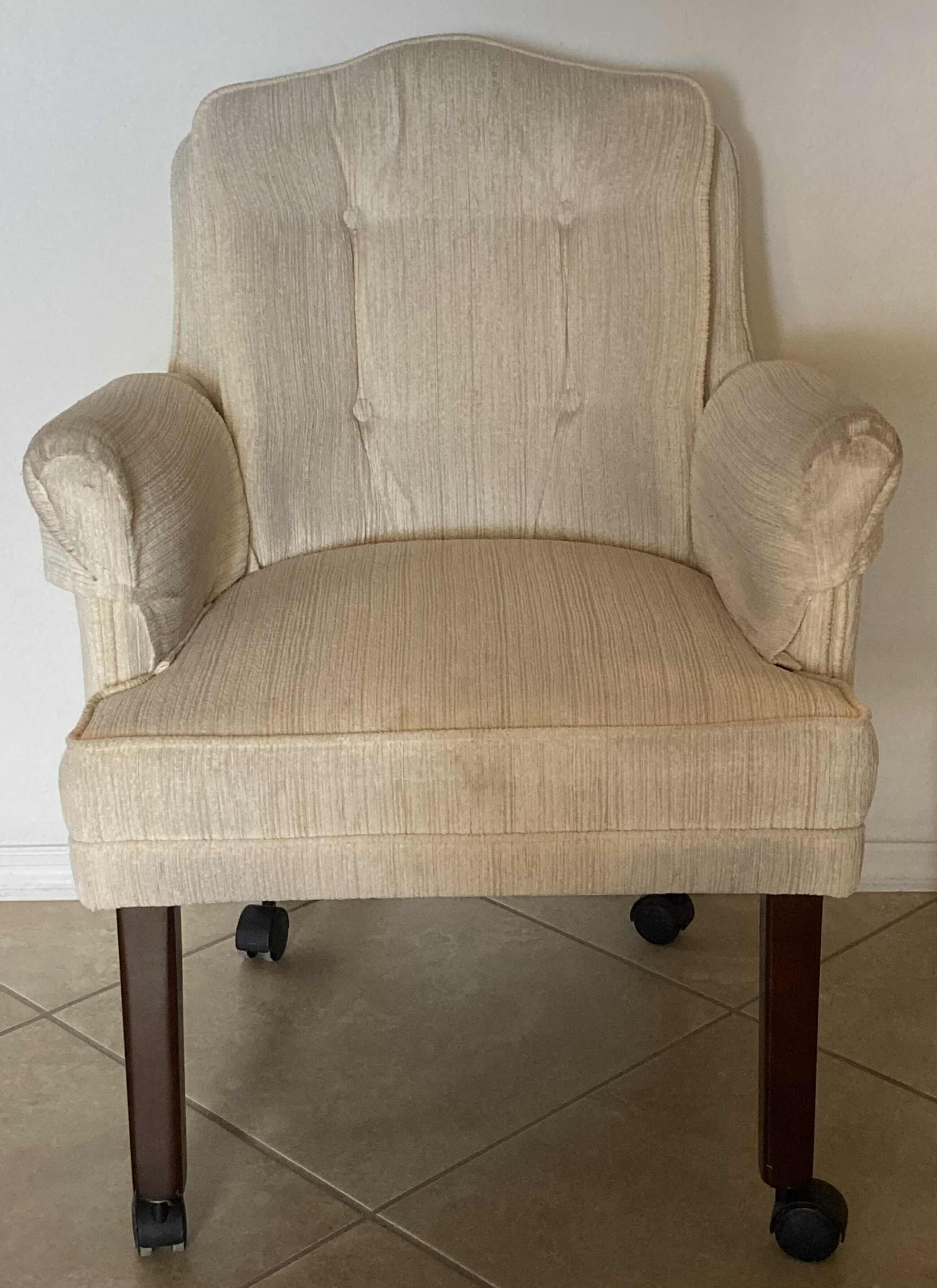 Photo 1 of BEIGE UPHOLSTERY SWIVEL CHAIR 24” X 24” H34”