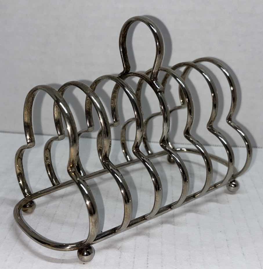 Photo 2 of SILVER PLATED TOAST RACK (2) & SILVER PLATED ANGEL NAPKIN HOLDERS (4)