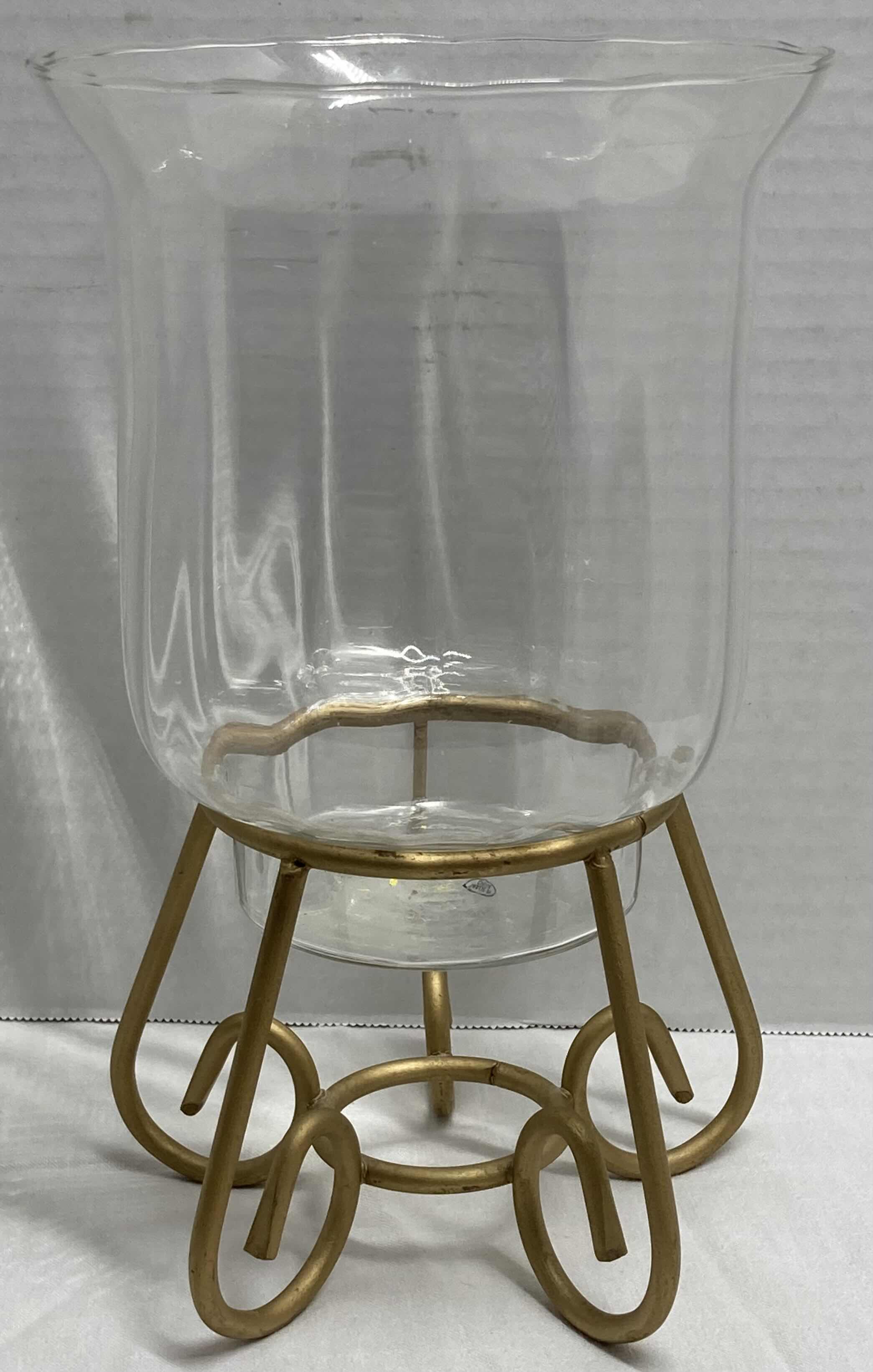 Photo 1 of PLASTIC CANDLE HOLDER W BRASS FINISH STAND 6.5” X 6.5” H10.5”