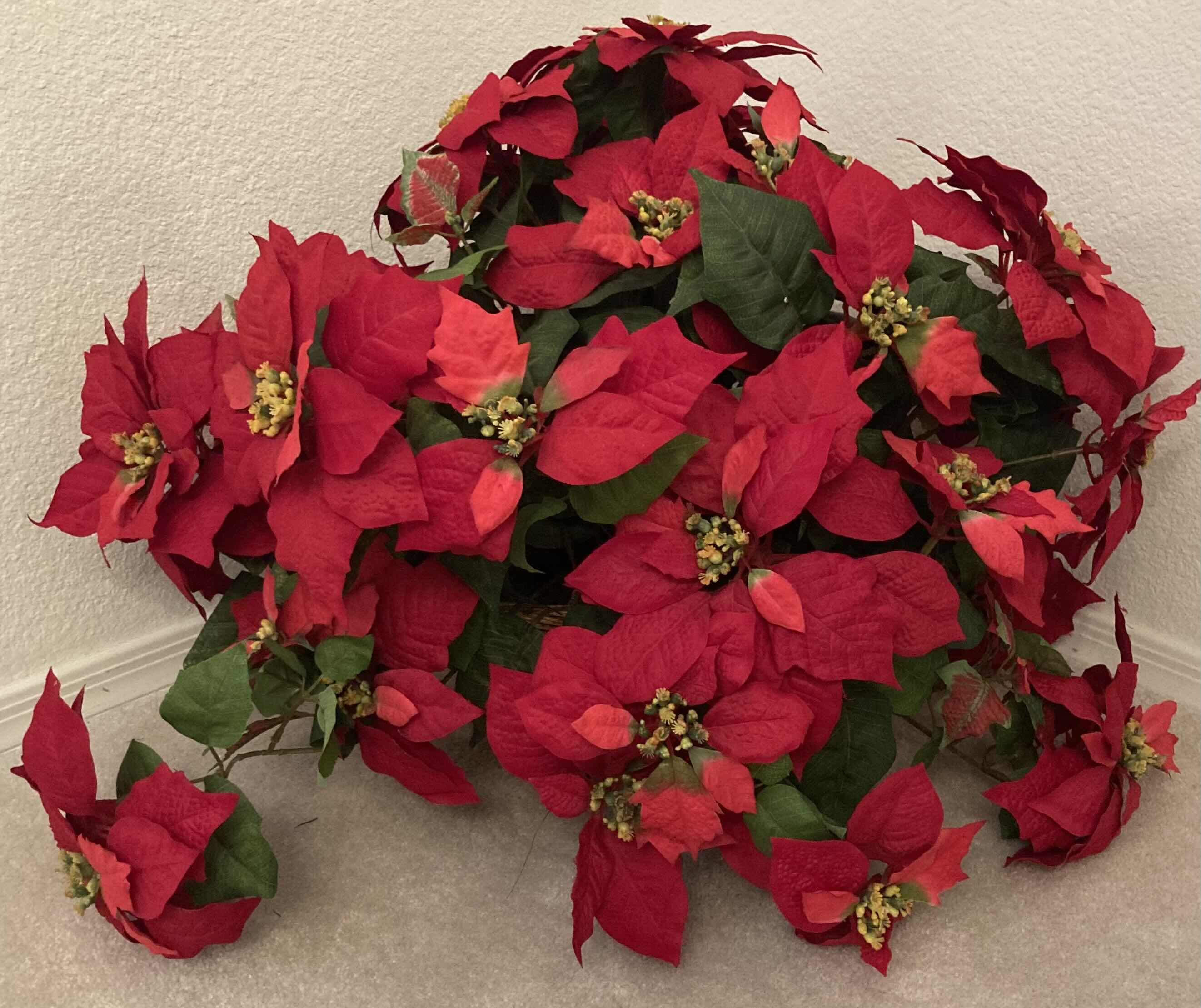 Photo 1 of POINSETTIA ARTIFICIAL DECORATIVE FLOWERS W RATTAN BASKET 28” X H18”