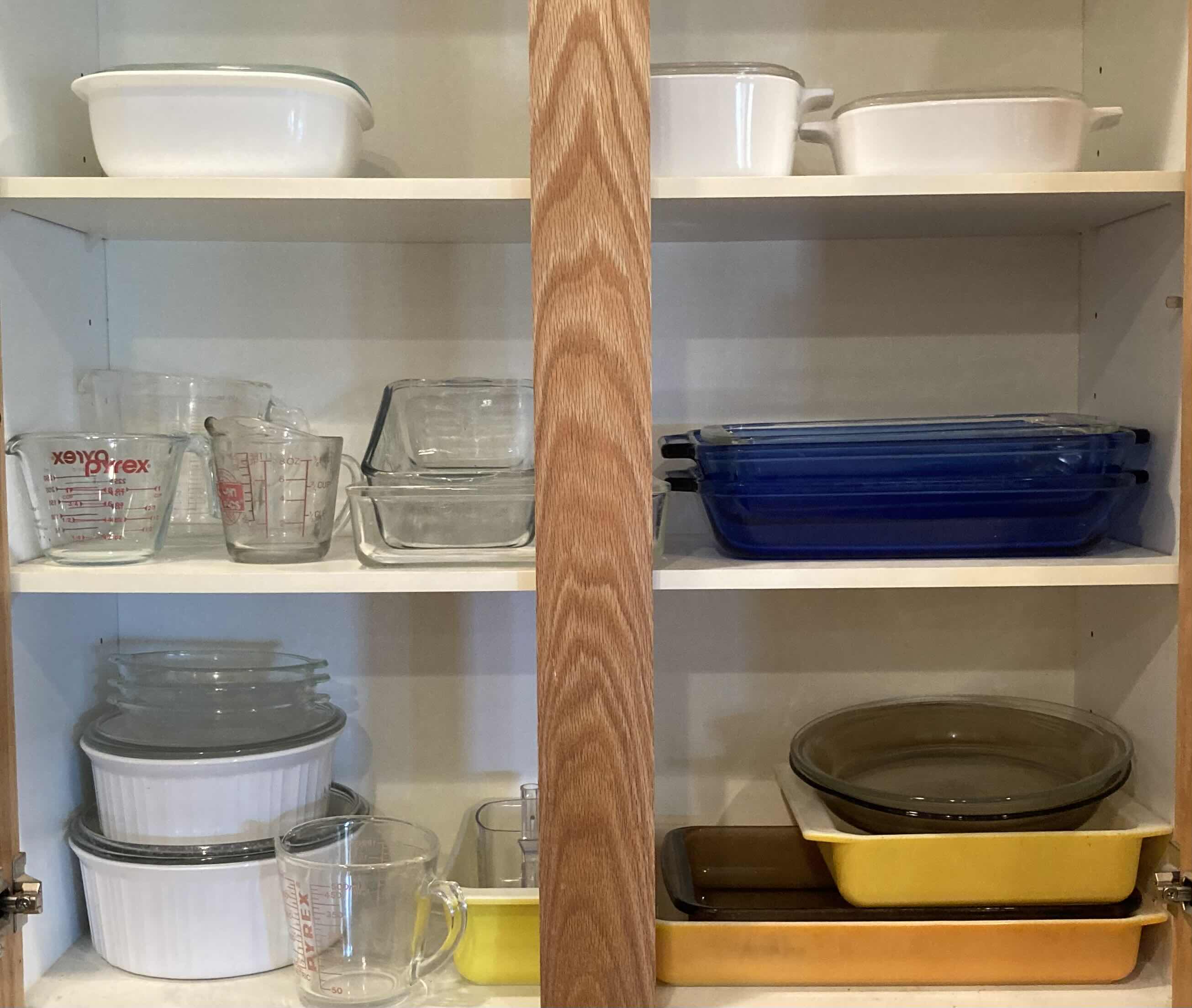 Photo 1 of CONTENTS OF CABINET- BAKING PANS VARIOUS STYLES/SIZES & MEASURING CUPS