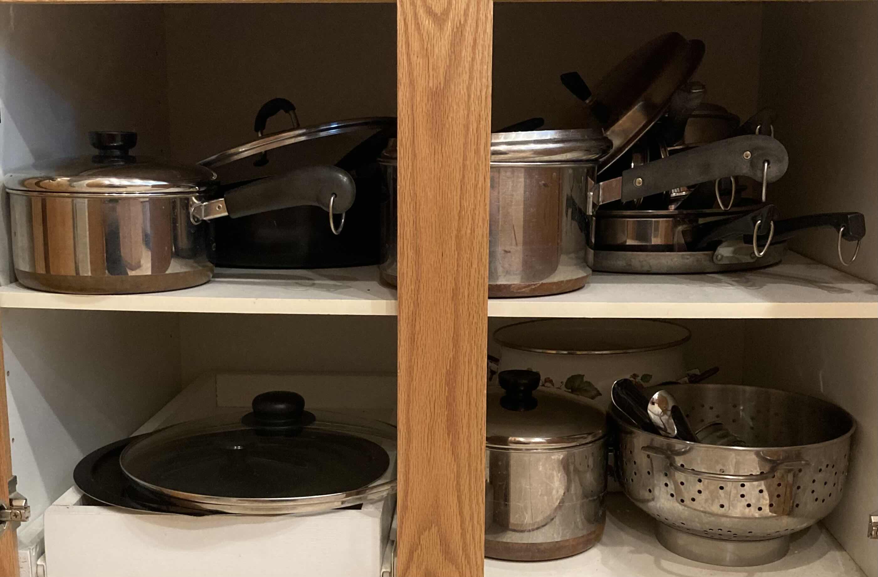 Photo 1 of CONTENTS OF CABINET- POTS & PANS